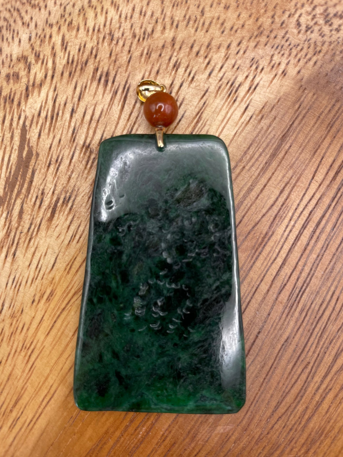 Grade A Natural icy green Jadeite mountain view pendant with 18K yellow gold bail