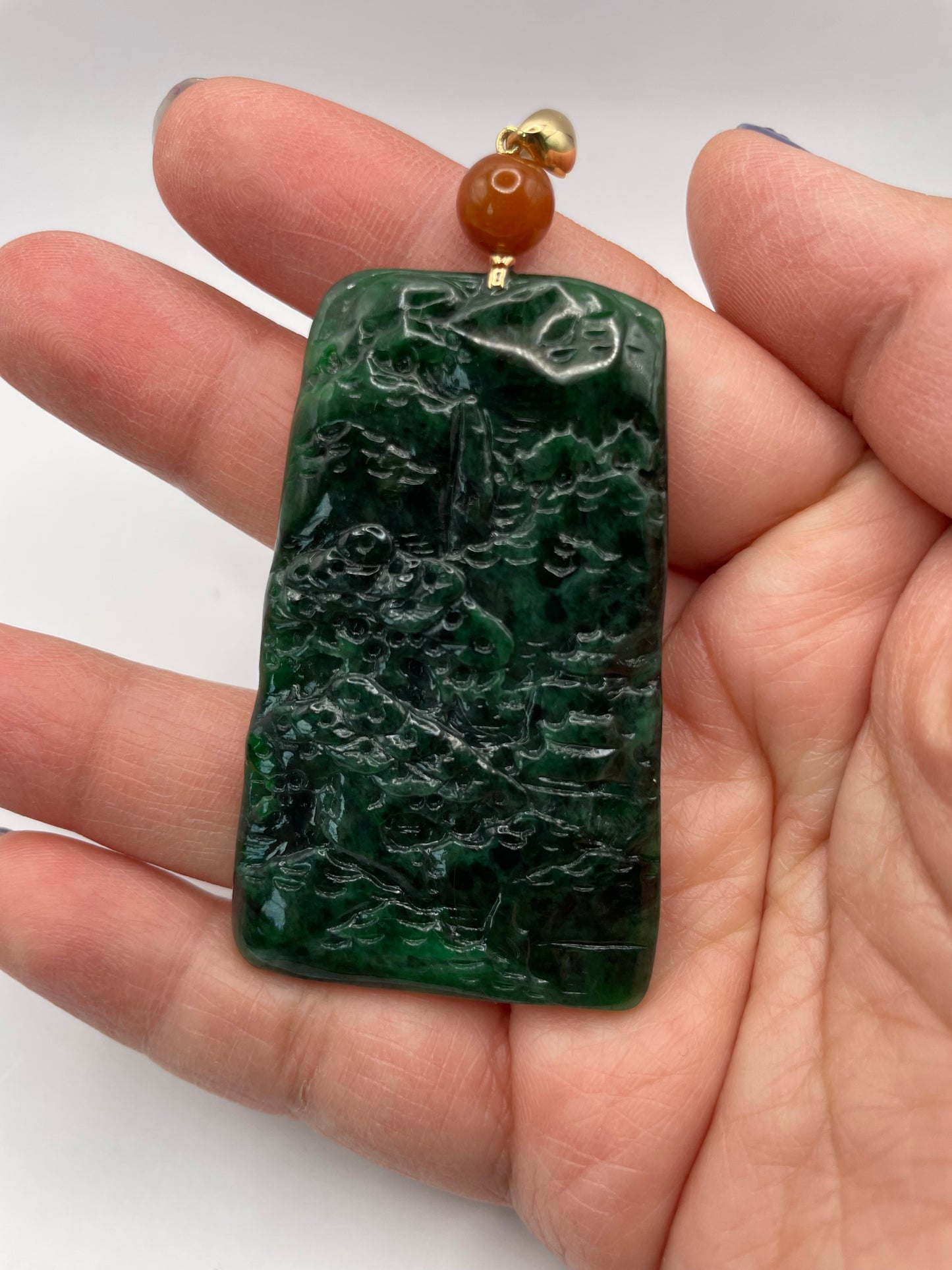 Grade A Natural icy green Jadeite mountain view pendant with 18K yellow gold bail