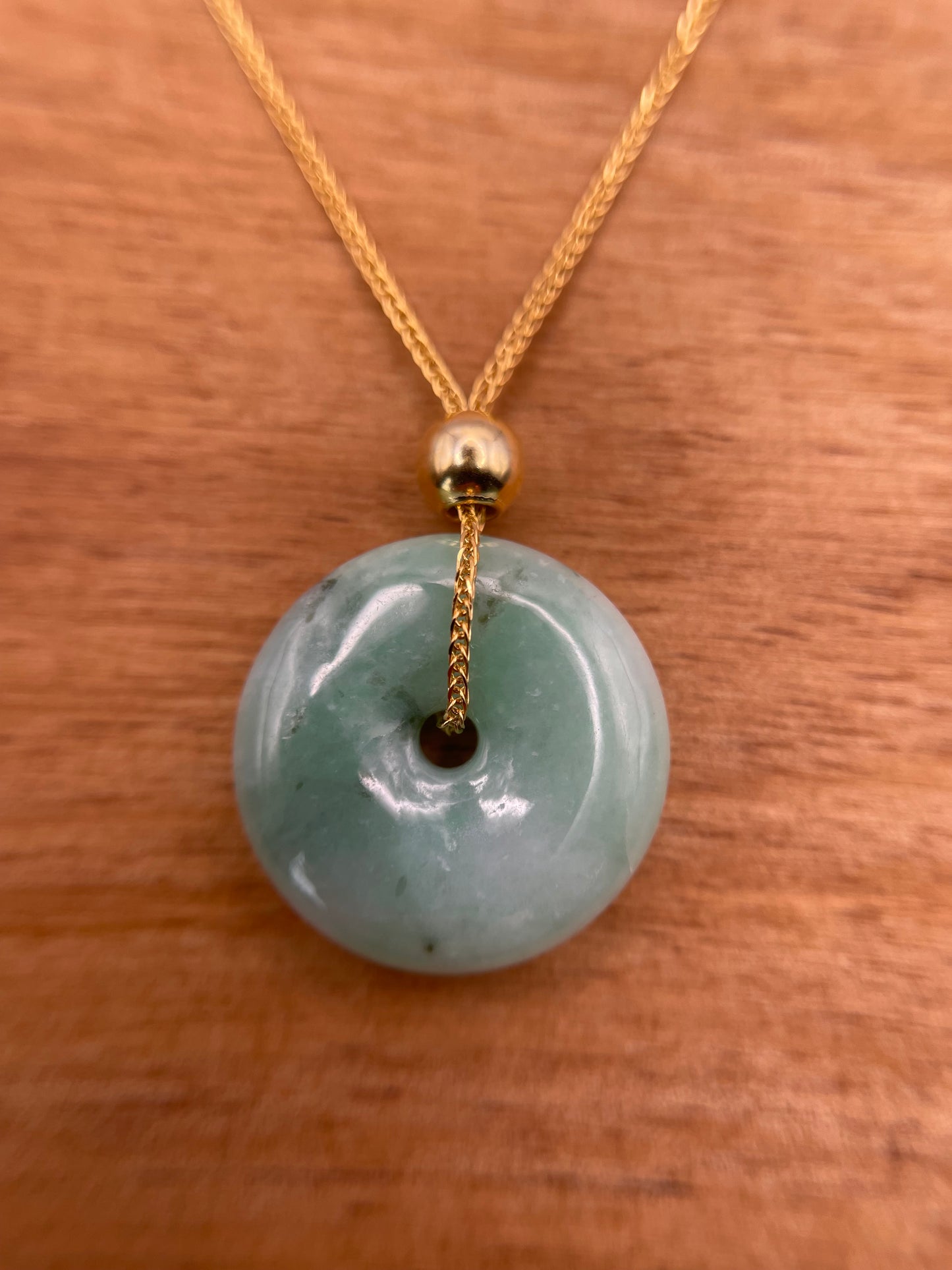 Grade A Natural green Jadeite Pi Disc ( peng on kou, donut) pendant with Gold over sterling bail
