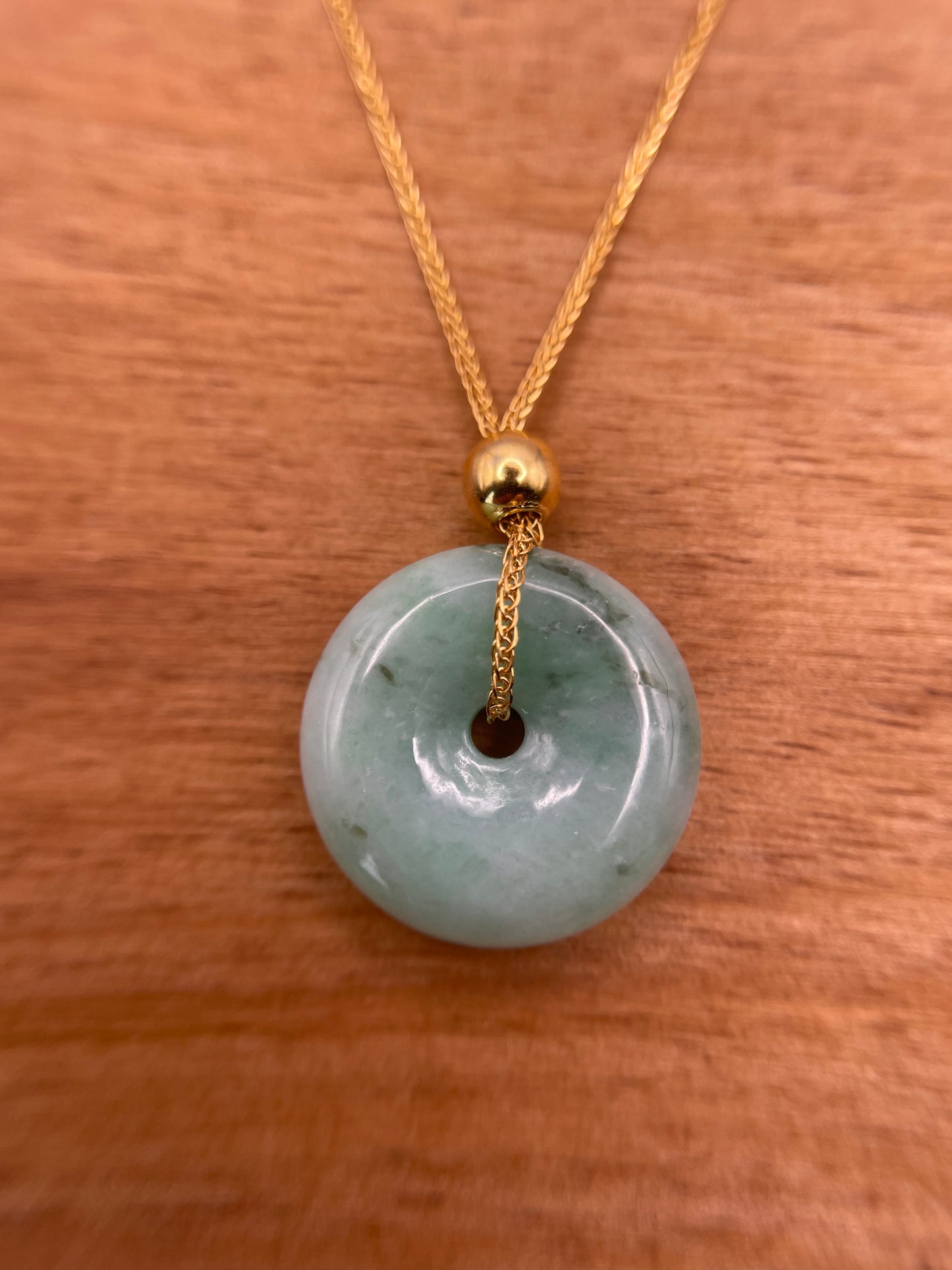 Grade A Natural green Jadeite Pi Disc ( peng on kou, donut) pendant with Gold over sterling bail