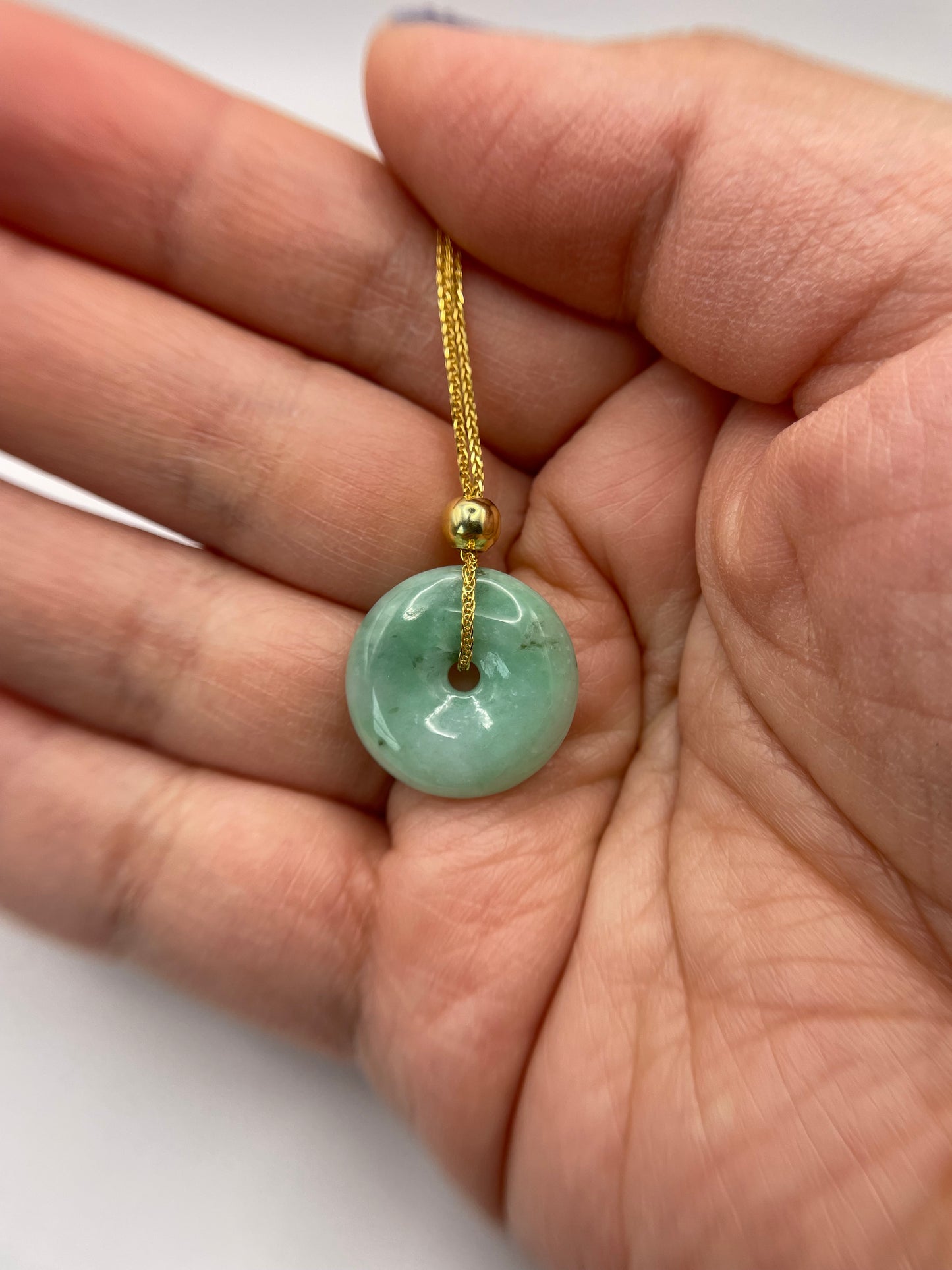 Grade A Natural green Jadeite Pi Disc ( peng on kou, donut) pendant with Gold over sterling bail