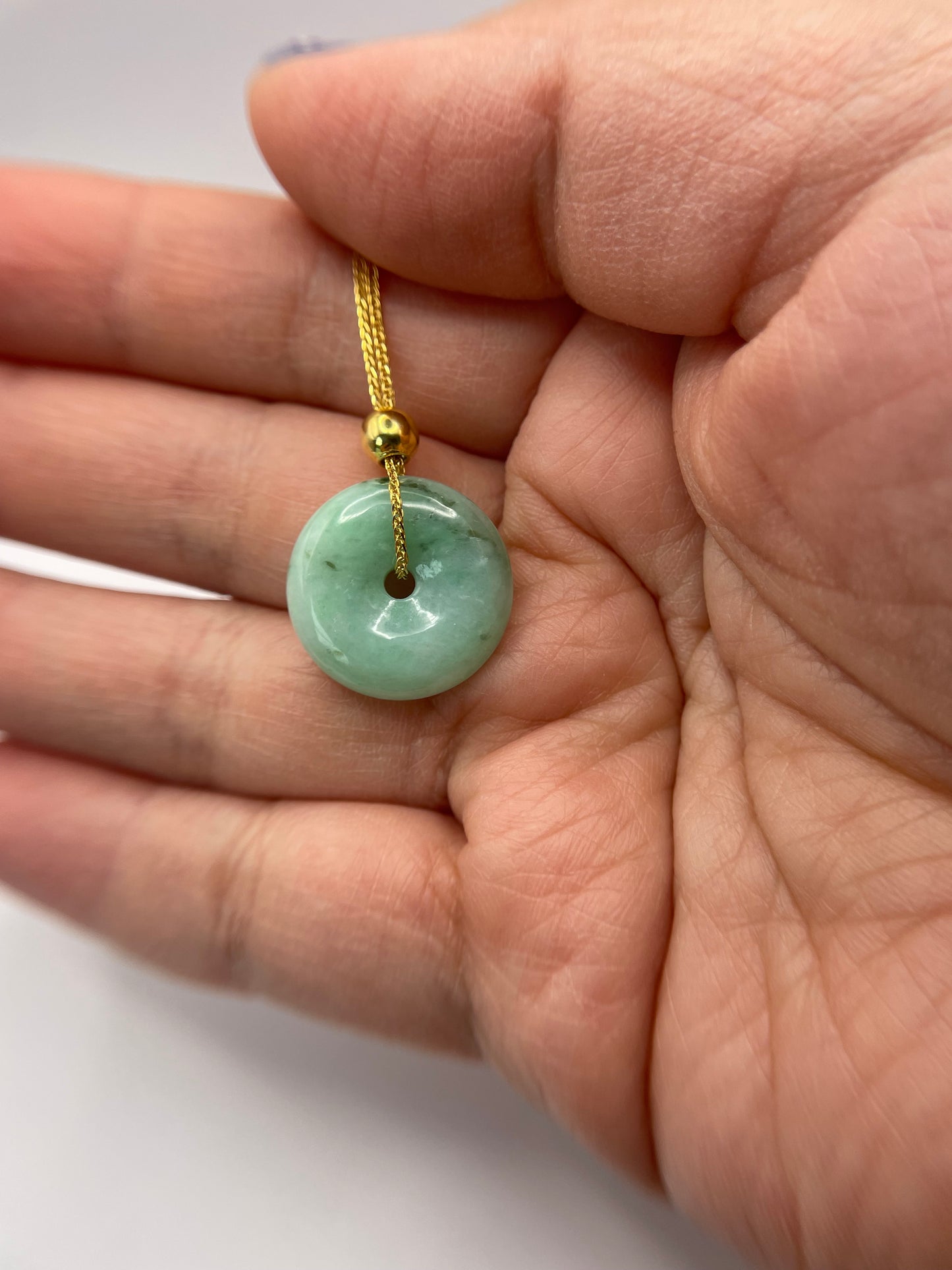 Grade A Natural green Jadeite Pi Disc ( peng on kou, donut) pendant with Gold over sterling bail