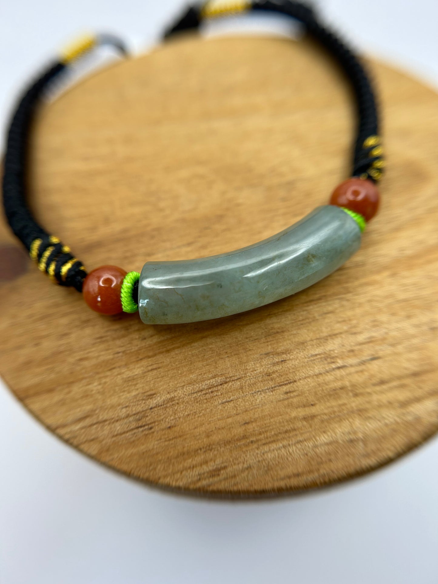 Grade A Natural Icy Green Burma Jadeite braided with black  and gold rope details Adjustable Bracelet