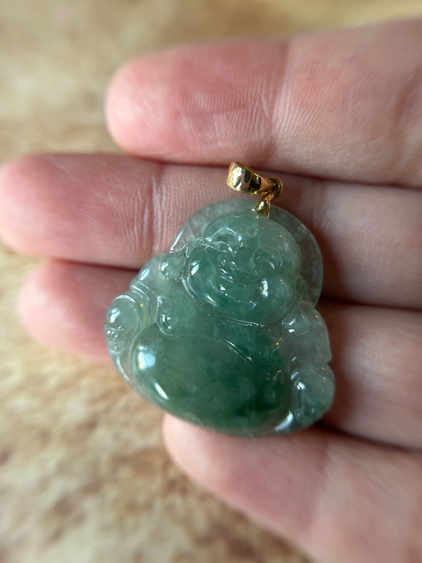 Icy green jadeite Buddha pendant with 18k yellow gold bail