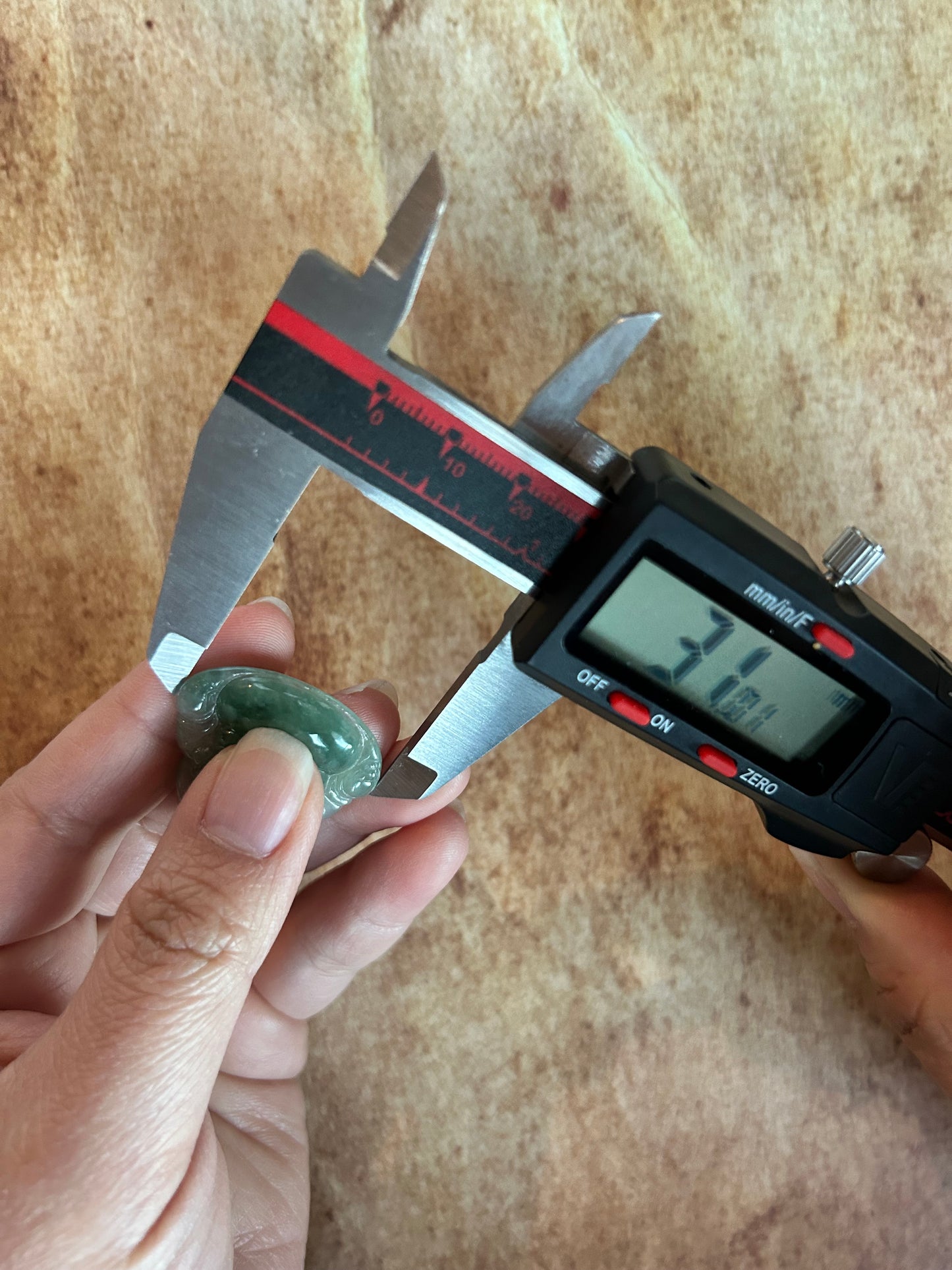 Icy green jadeite Buddha pendant with 18k yellow gold bail