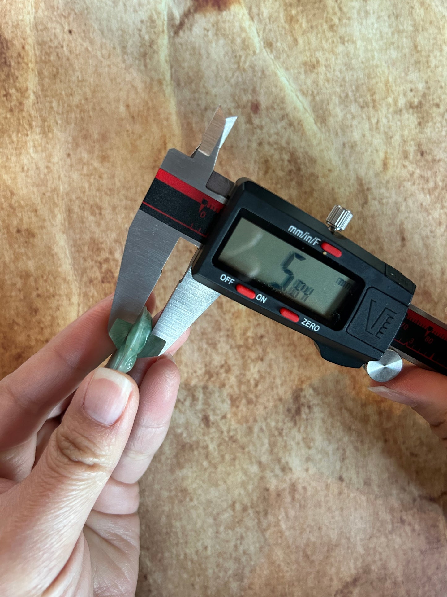 Icy green jadeite Buddha pendant with 18k yellow gold bail