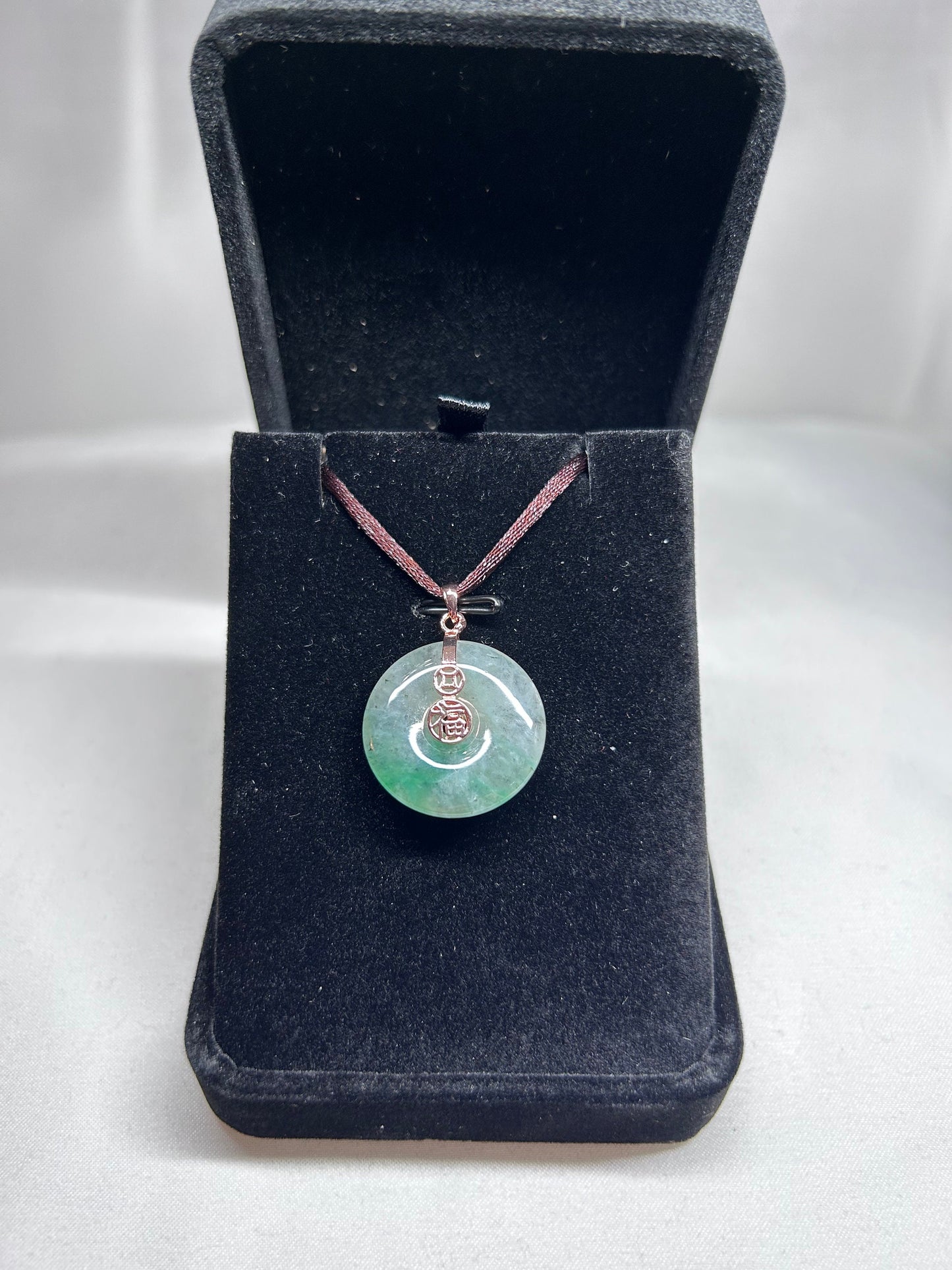 Grade A Natural Icy green Burmese jadeite donut ( ping on kou) pendant on rose gold plated sterling silver bail
