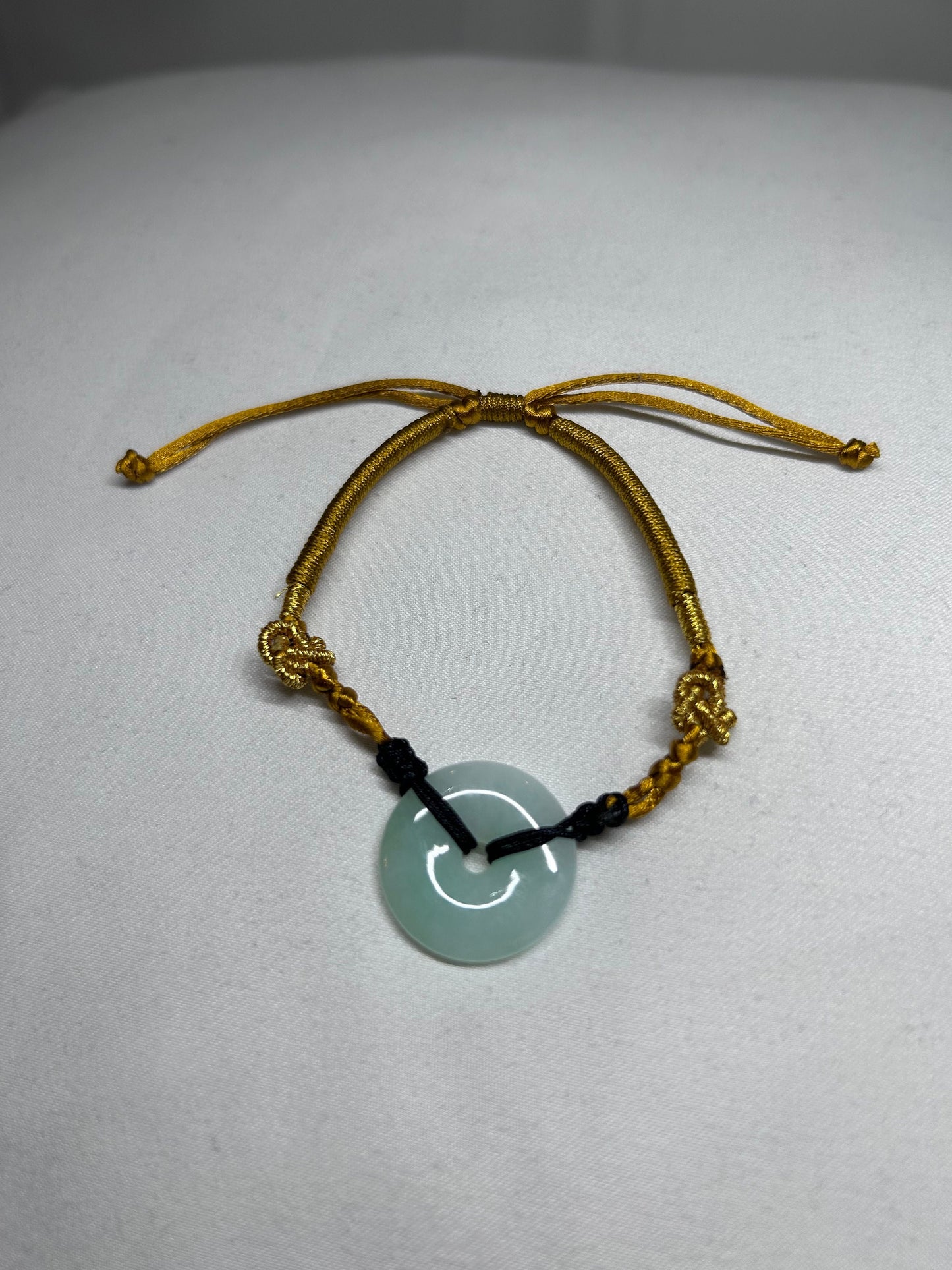 Grade A Natural Icy green Burmese jadeite bracelet braided with gold rope