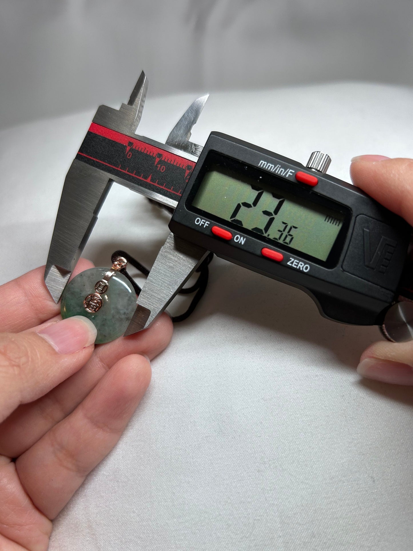 Grade A Natural Icy green Burmese jadeite donut ( ping on kou) pendant on rose gold plated sterling silver bail