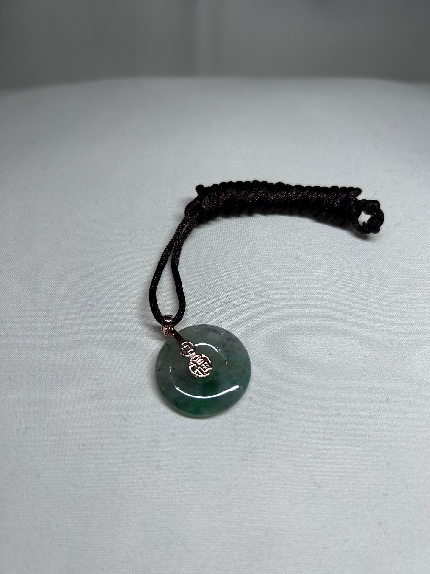Grade A Natural Icy green Burmese jadeite donut ( ping on kou) pendant on rose gold plated sterling silver bail