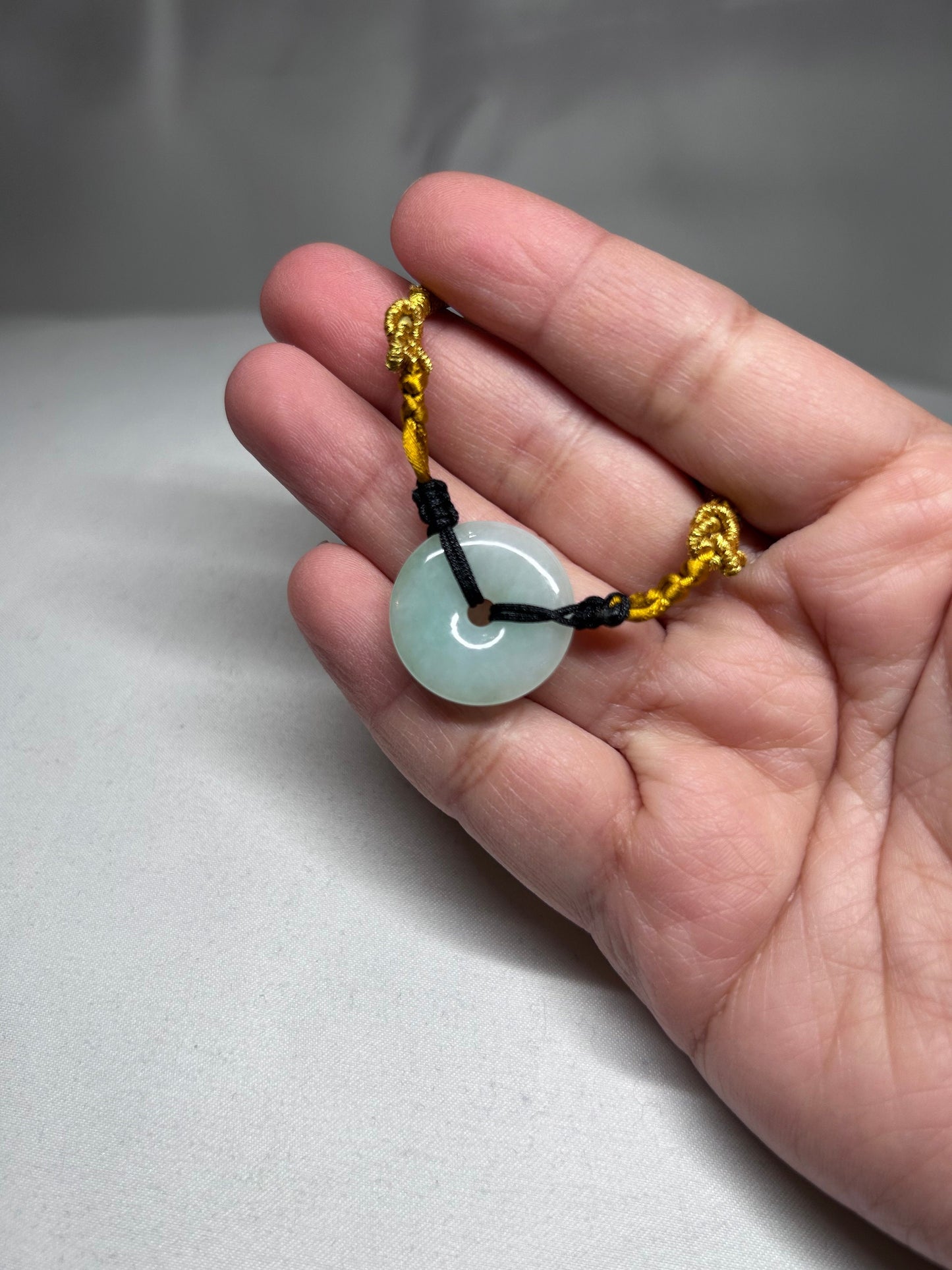 Grade A Natural Icy green Burmese jadeite bracelet braided with gold rope