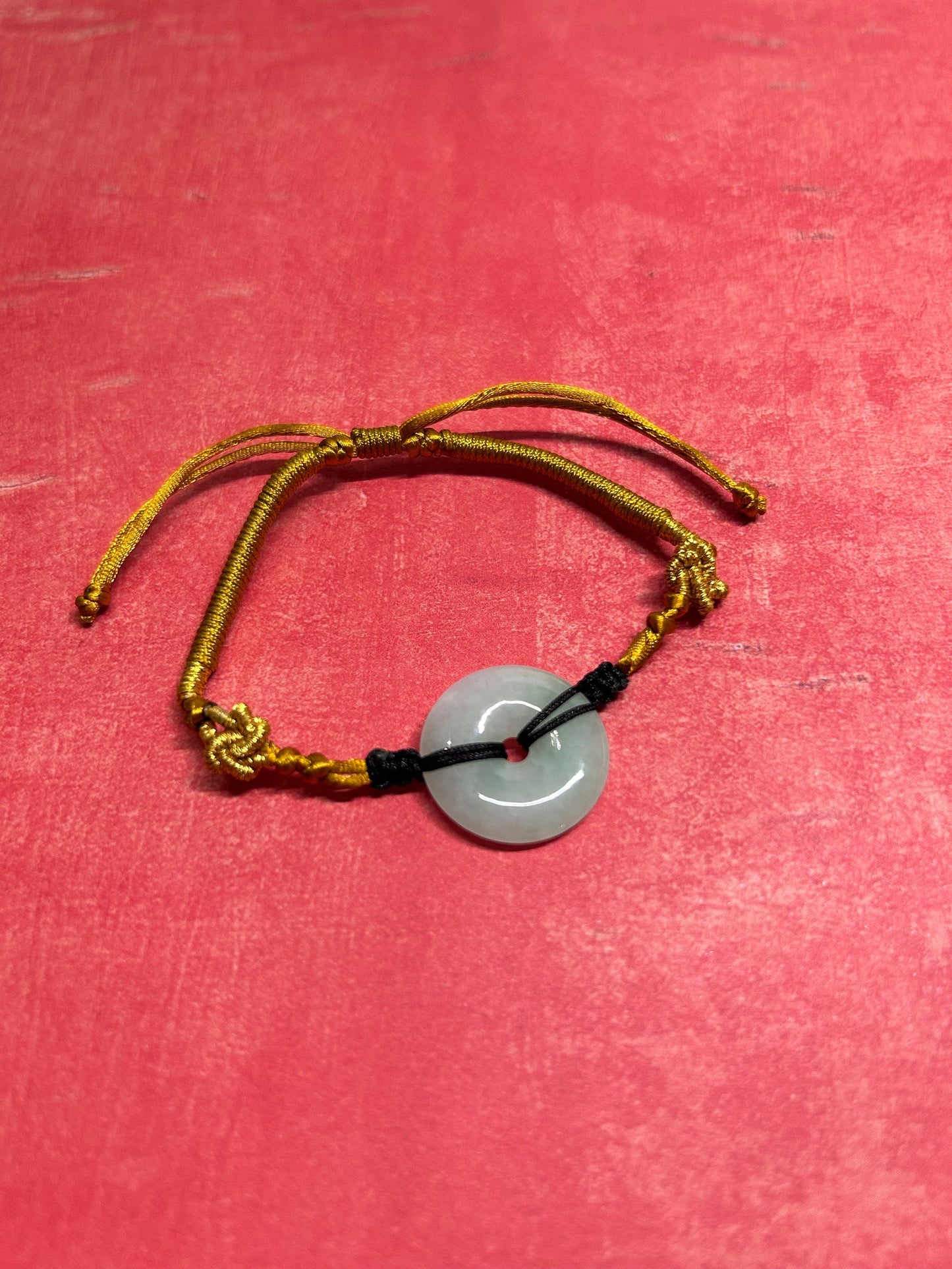 Grade A Natural Icy green Burmese jadeite bracelet braided with gold rope