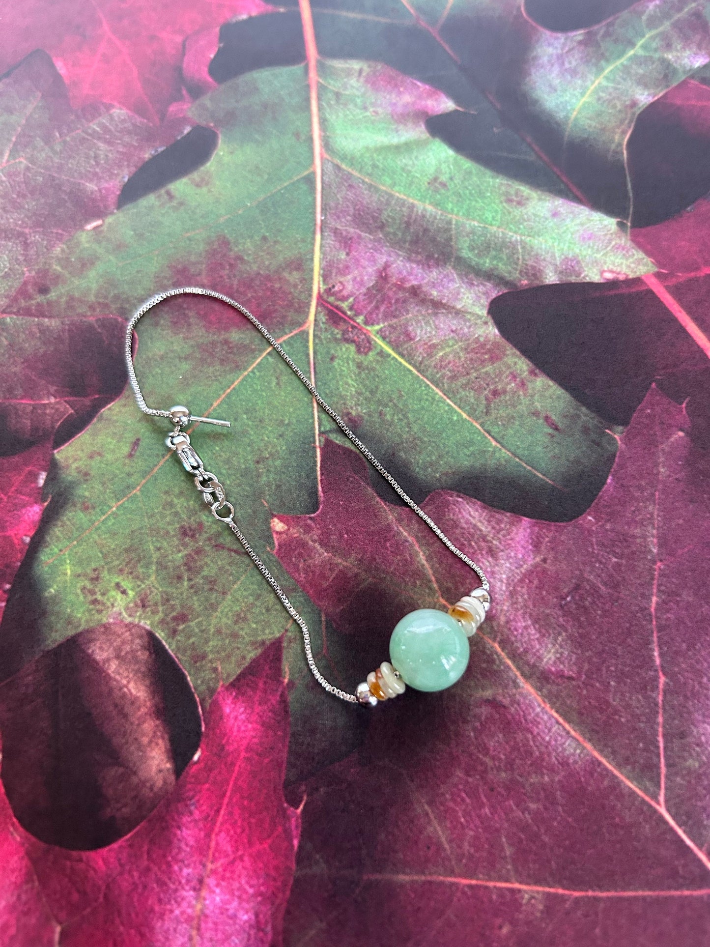 Grade A Natural Burma Icy green bead, with white and red donut Jadeite adjustable sterling silver bracelet