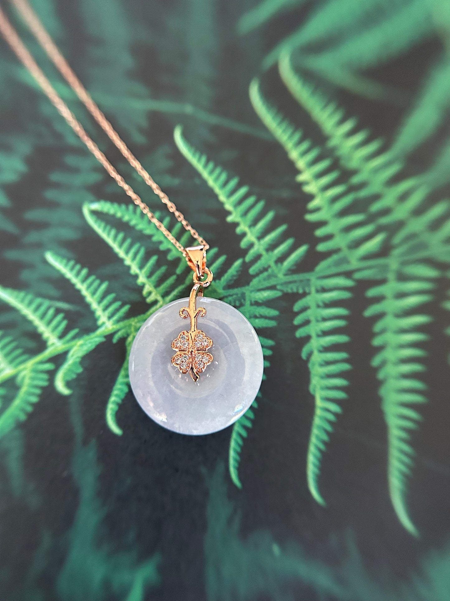 Grade A Natural Burma lavender Jadeite Pi Disc (peng on kou, donut) pendant with a sterling silver, rose gold plated four leaves clover bail
