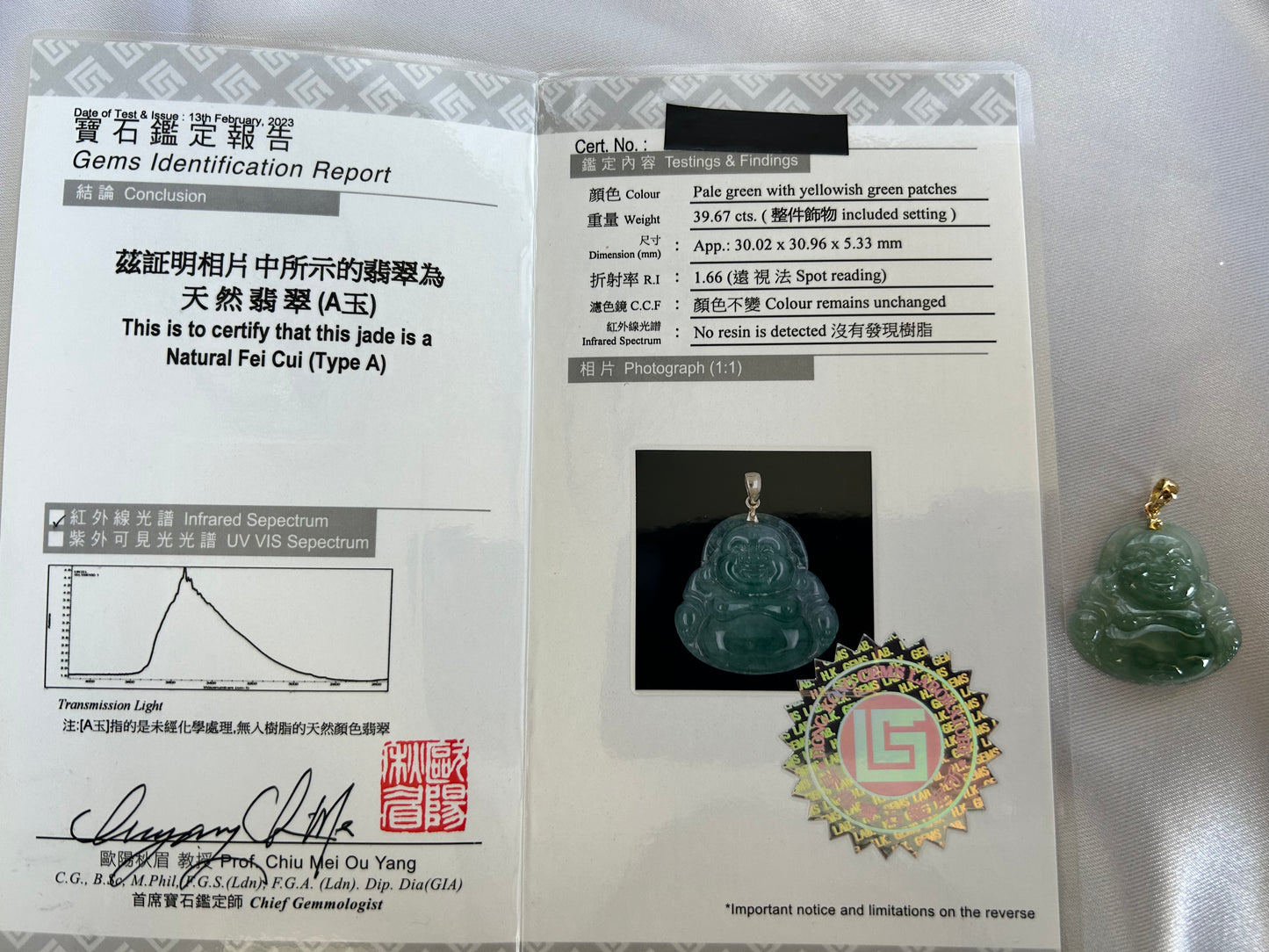 Icy green jadeite Buddha pendant with 18k yellow gold bail