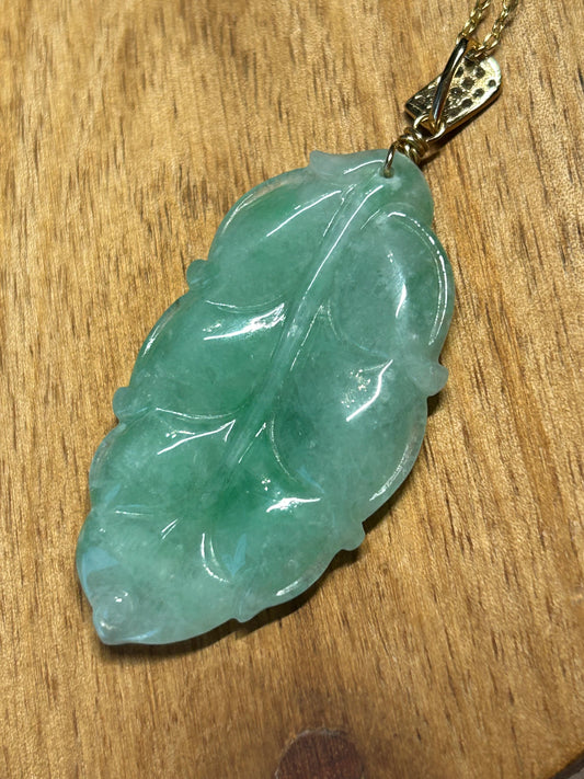 Grade A Natural Icy green Burma Jadeite pendant with double sided hand carved with leaf gold over sterling silver bail pendant