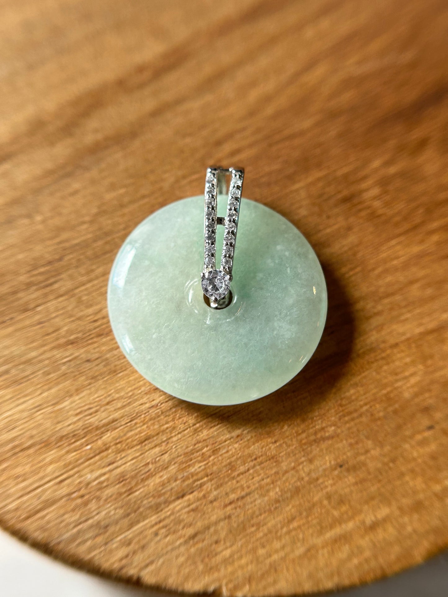 Grade A Natural green Jadeite Pi Disc ( peng on kou, donut) pendant with 2 rows zircon sterling silver  bail