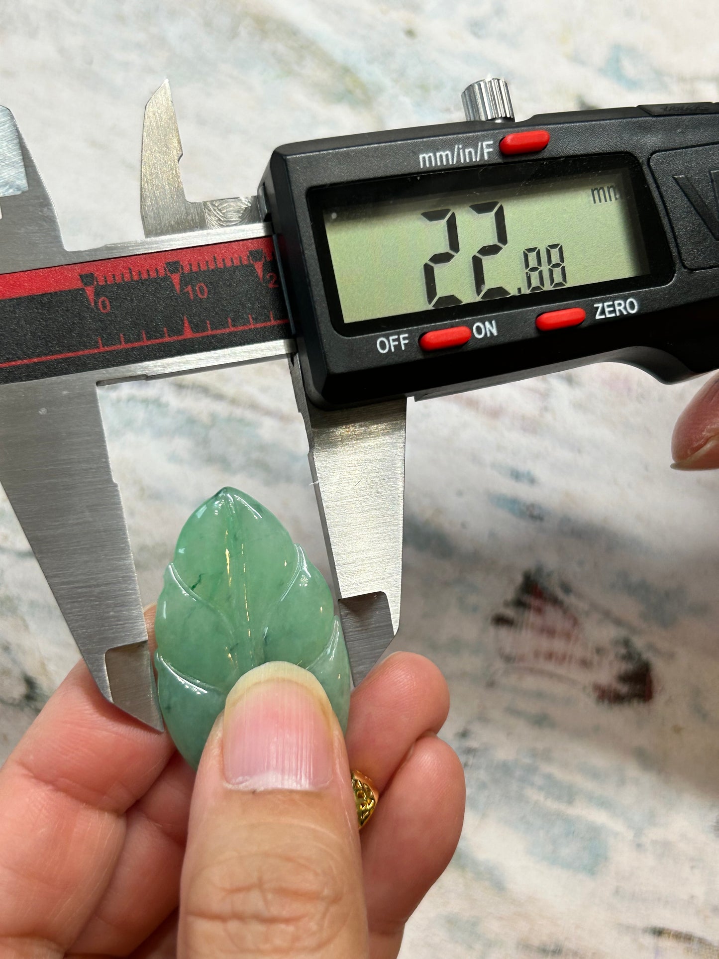 Grade A Natural Icy green Burma Jadeite pendant with double sided hand carved with leaf gold over sterling silver bail pendant