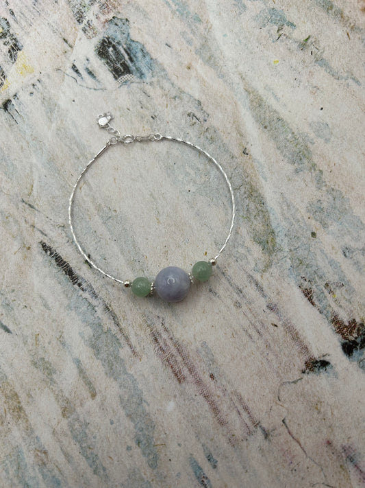 Grade A Natural Lavender and Green Burmese Jadeite beads on a sterling silver bracelet
