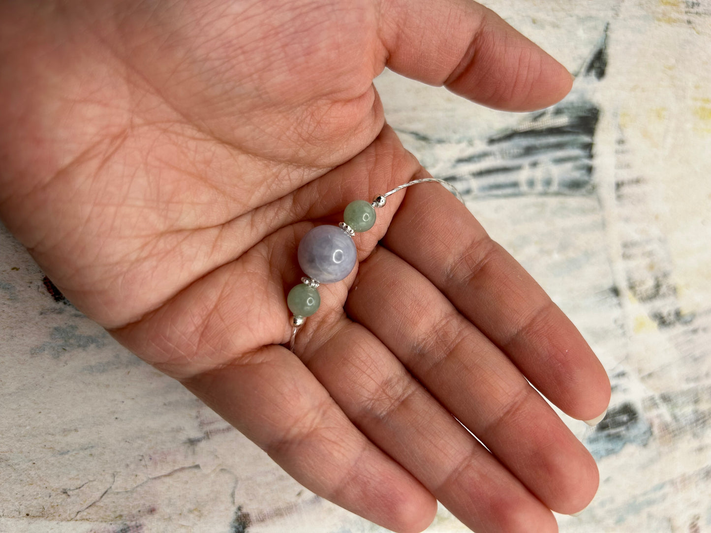 Grade A Natural Lavender and Green Burmese Jadeite beads on a sterling silver bracelet