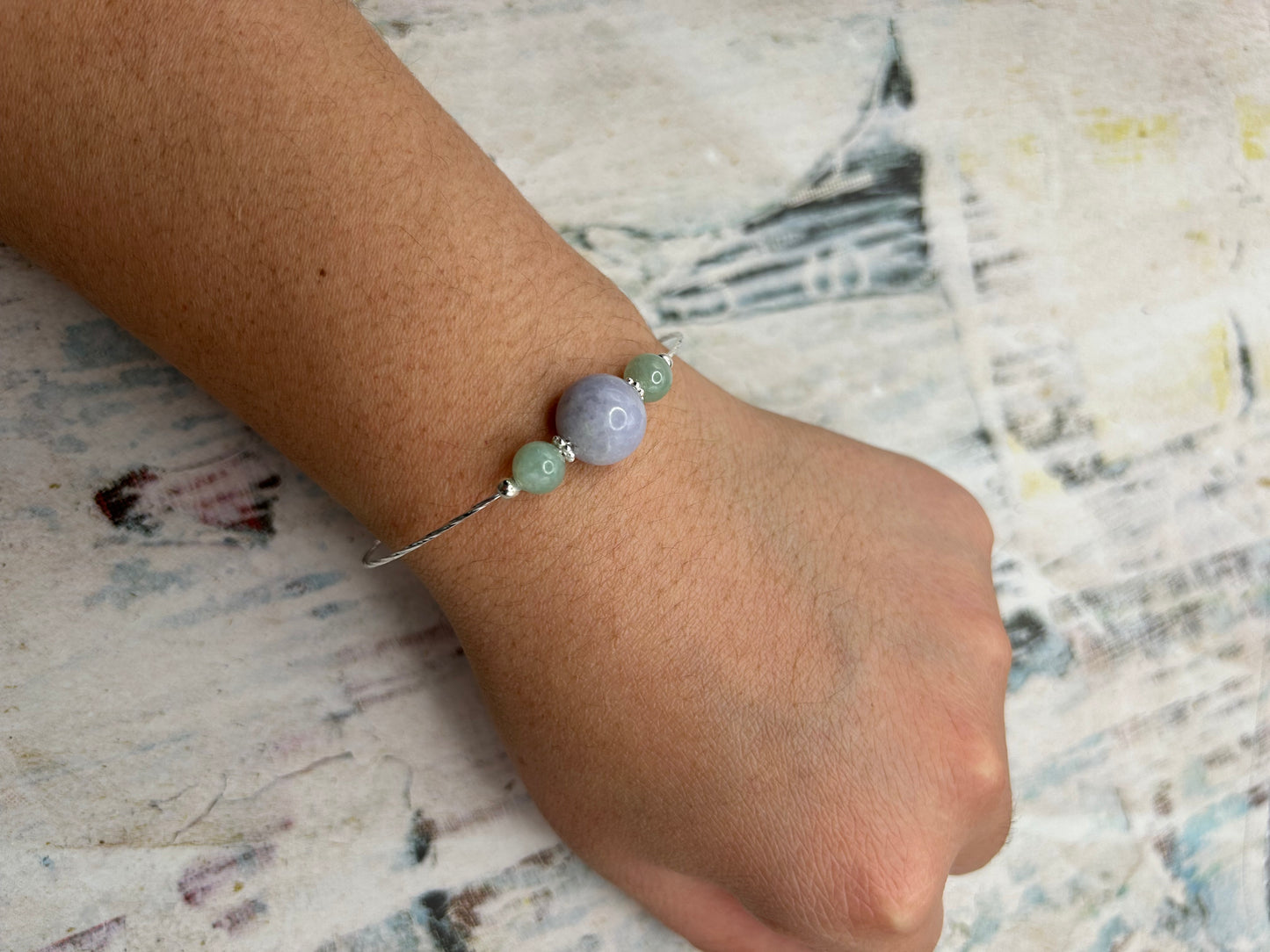 Grade A Natural Lavender and Green Burmese Jadeite beads on a sterling silver bracelet