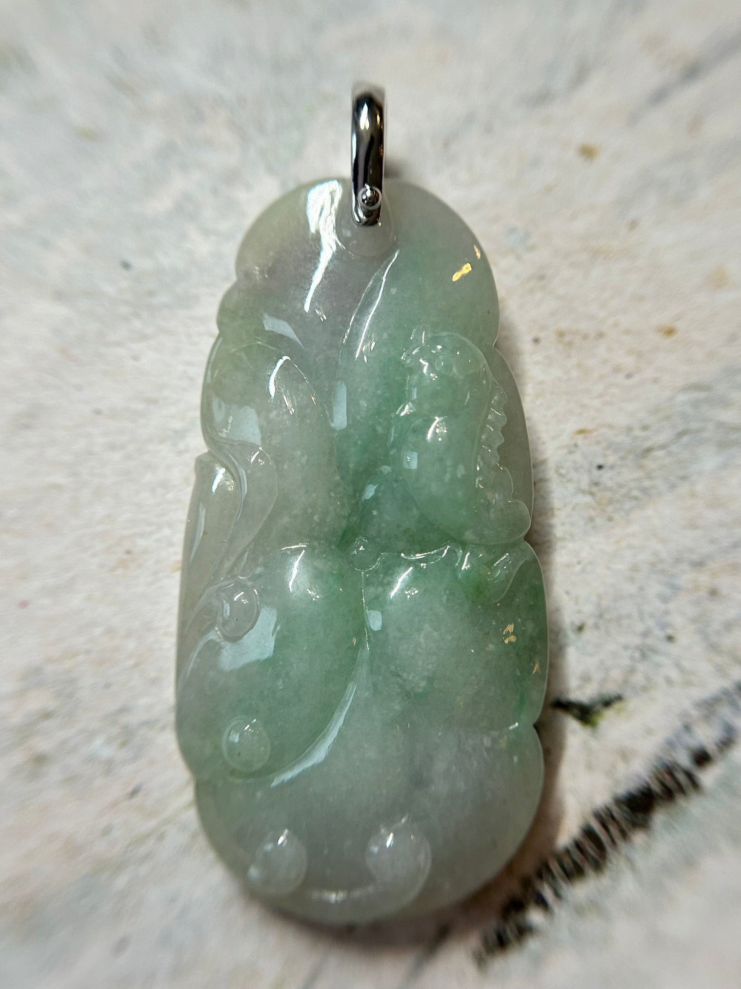 Grade A Natural Icy green and lavender Burma Jadeite pendant with double sided hand carved with fish and flower