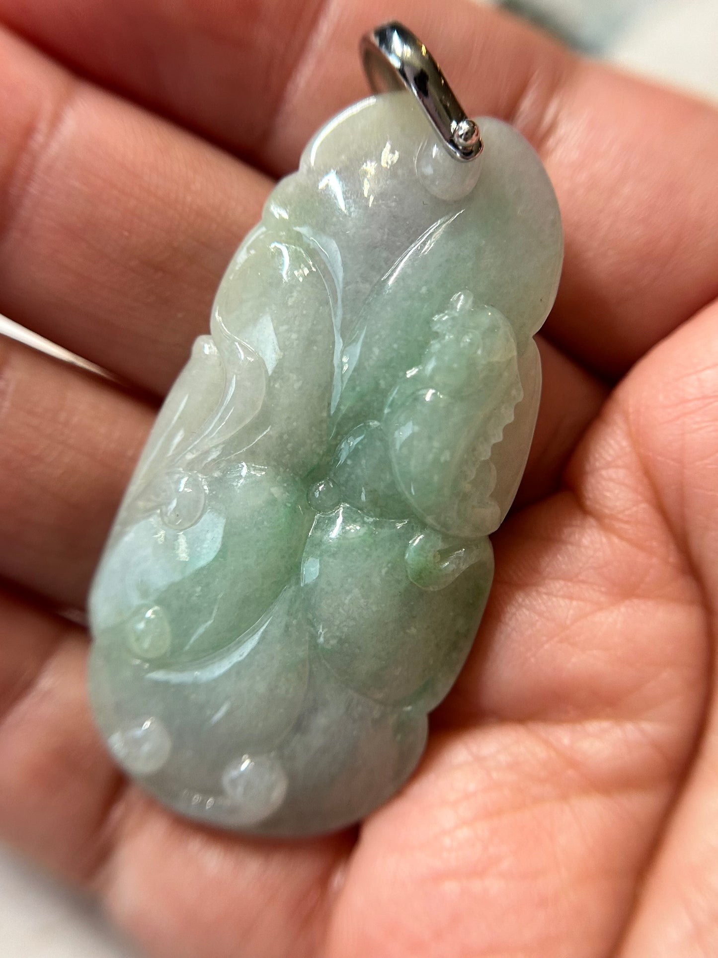 Grade A Natural Icy green and lavender Burma Jadeite pendant with double sided hand carved with fish and flower