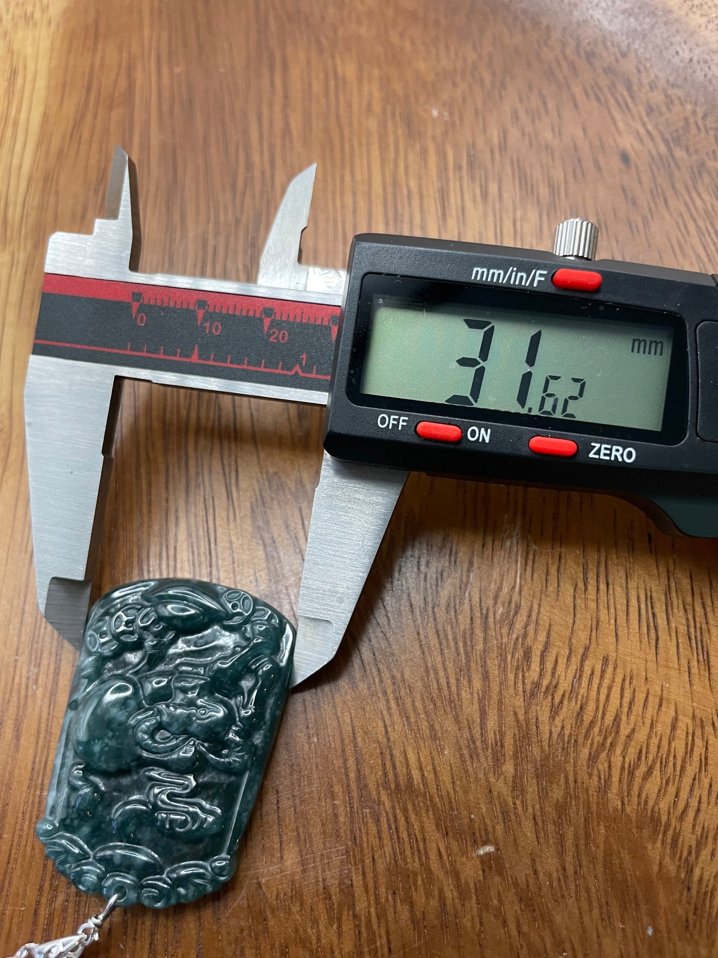 Grade A  jadeite Zodiac (OX) pendant with silver necklace