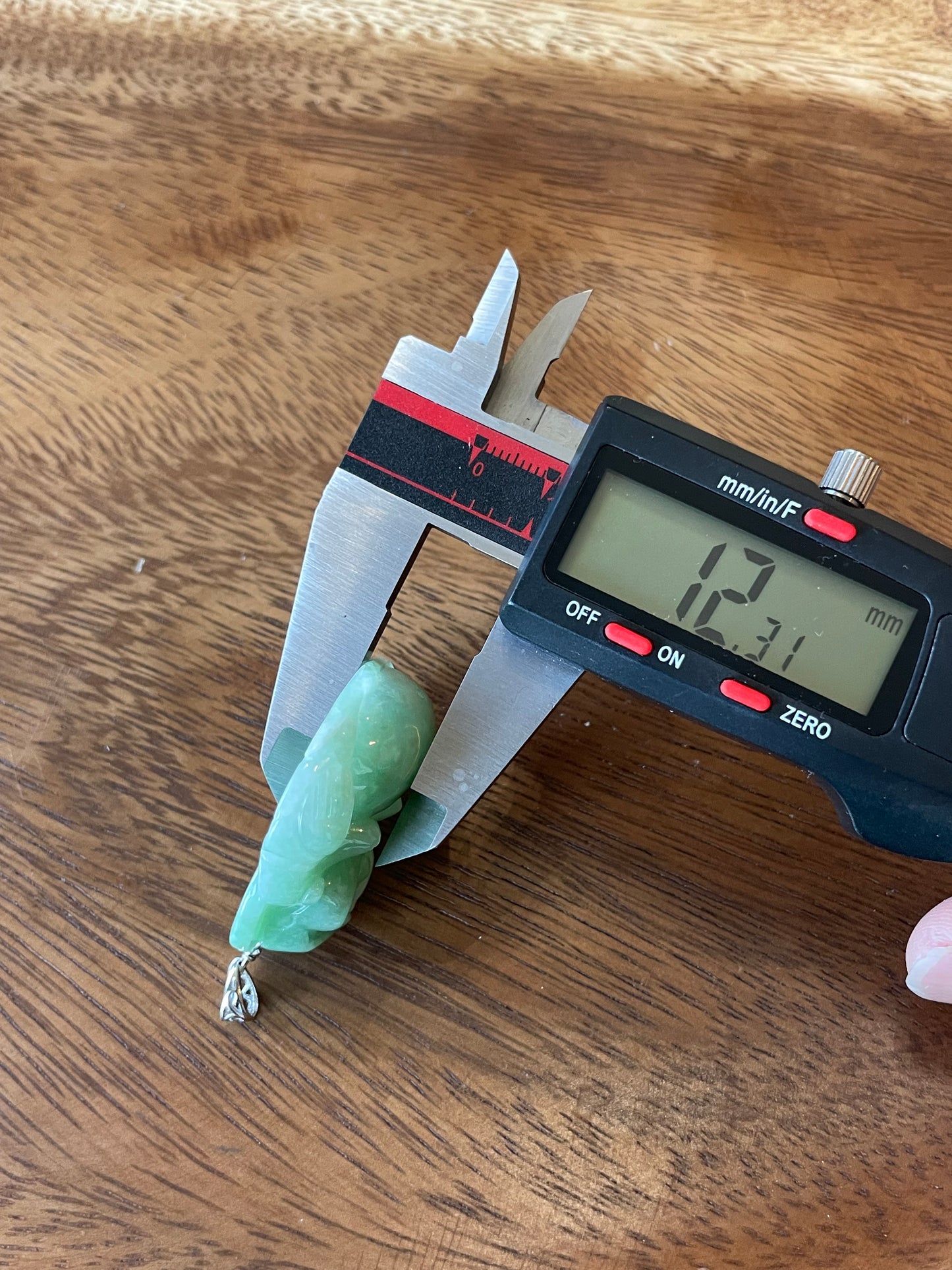 Icy Green jadeite Buddha pendant with Sterling silver bail
