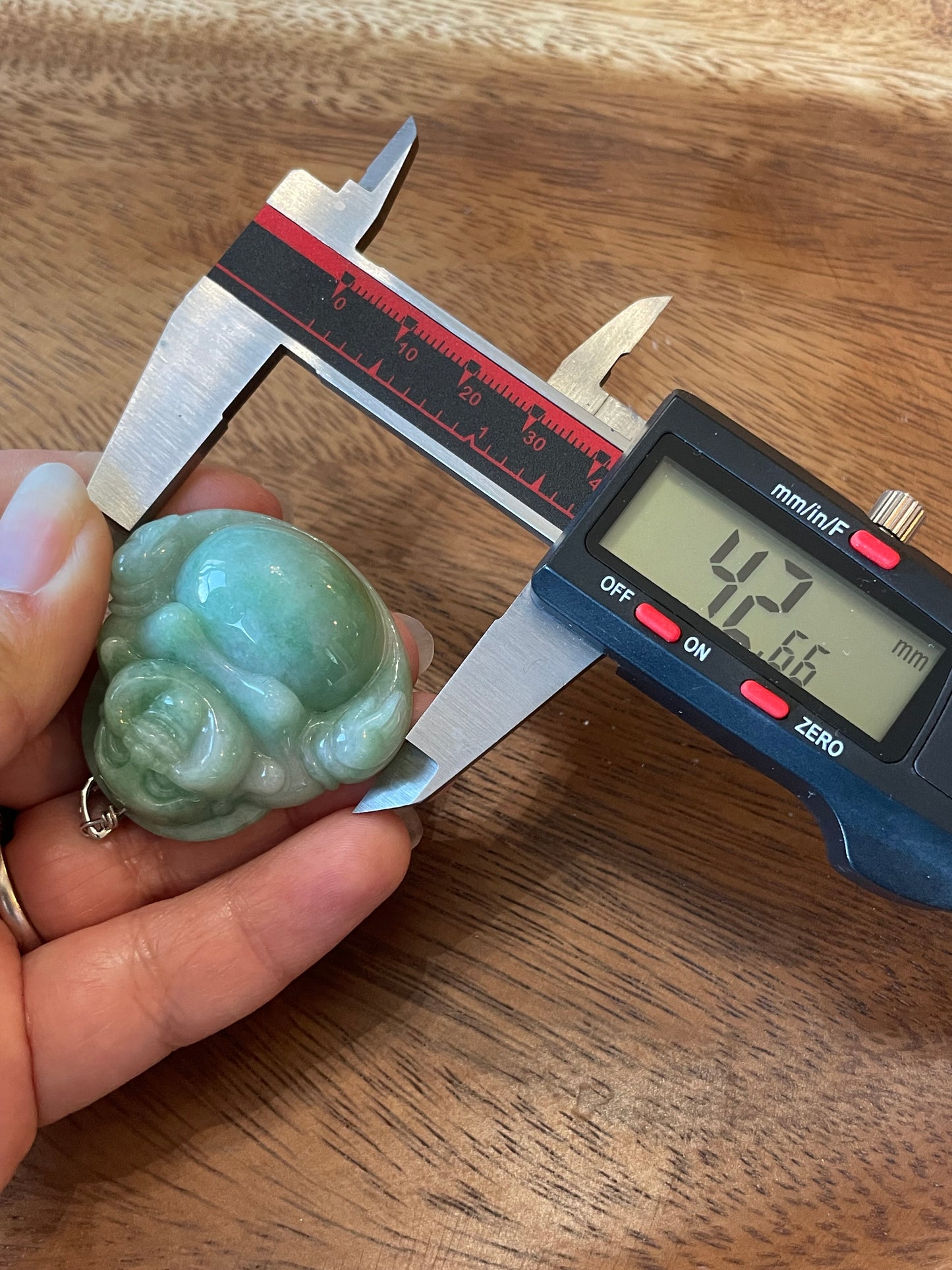 Icy Green jadeite Buddha pendant with Sterling silver bail