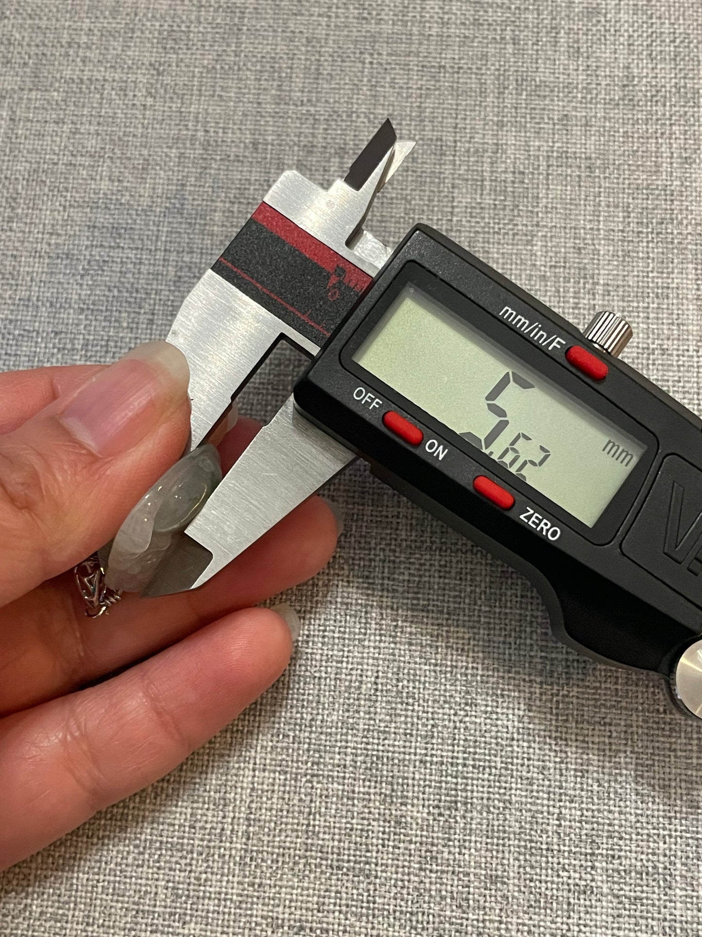 Icy Green jadeite Buddha pendant with Sterling silver bail