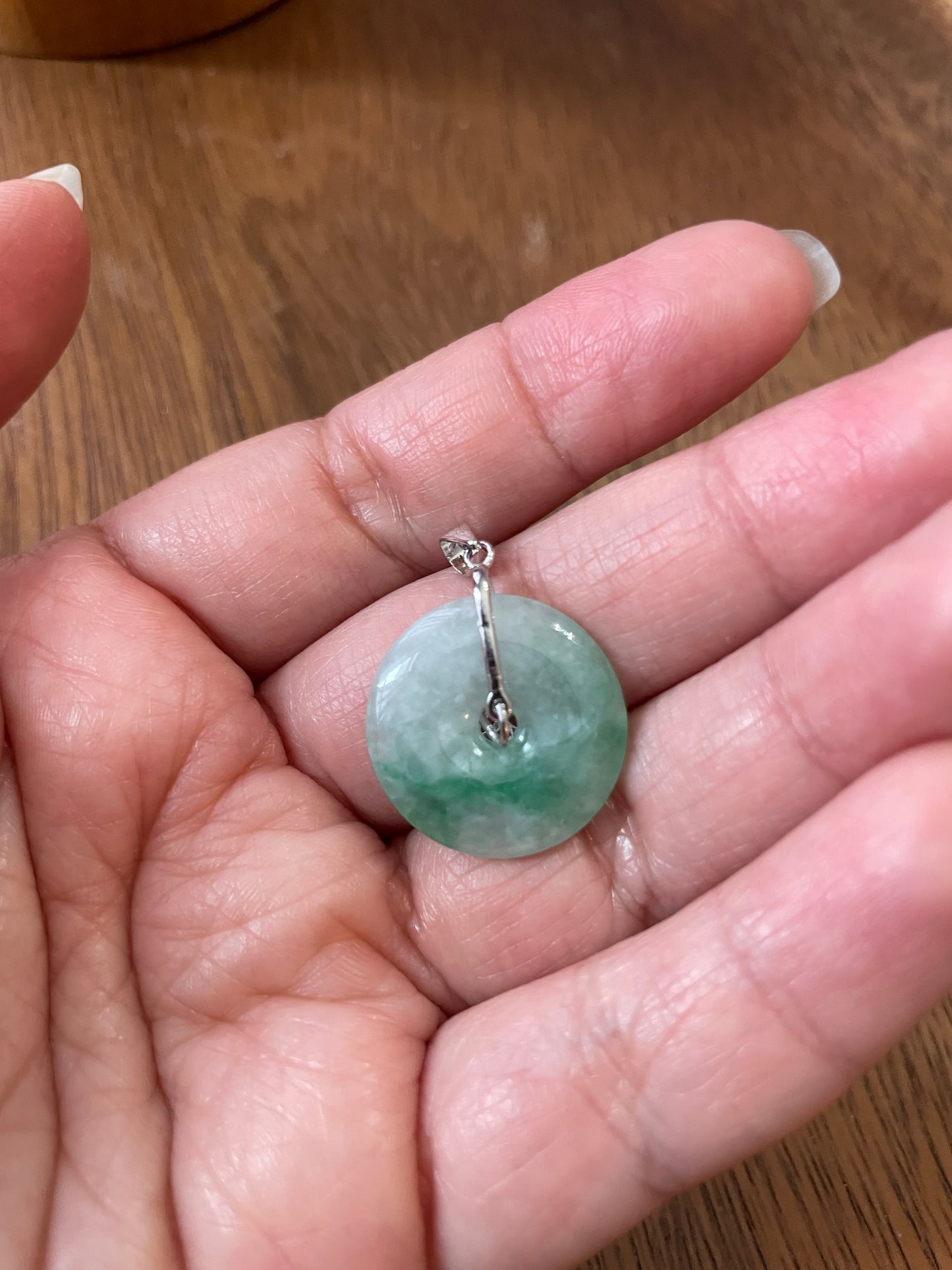 Grade A Natural Green Jadeite Pi Disc ( peng on kou, donut) pendant with sterling silver four leaves clover bail