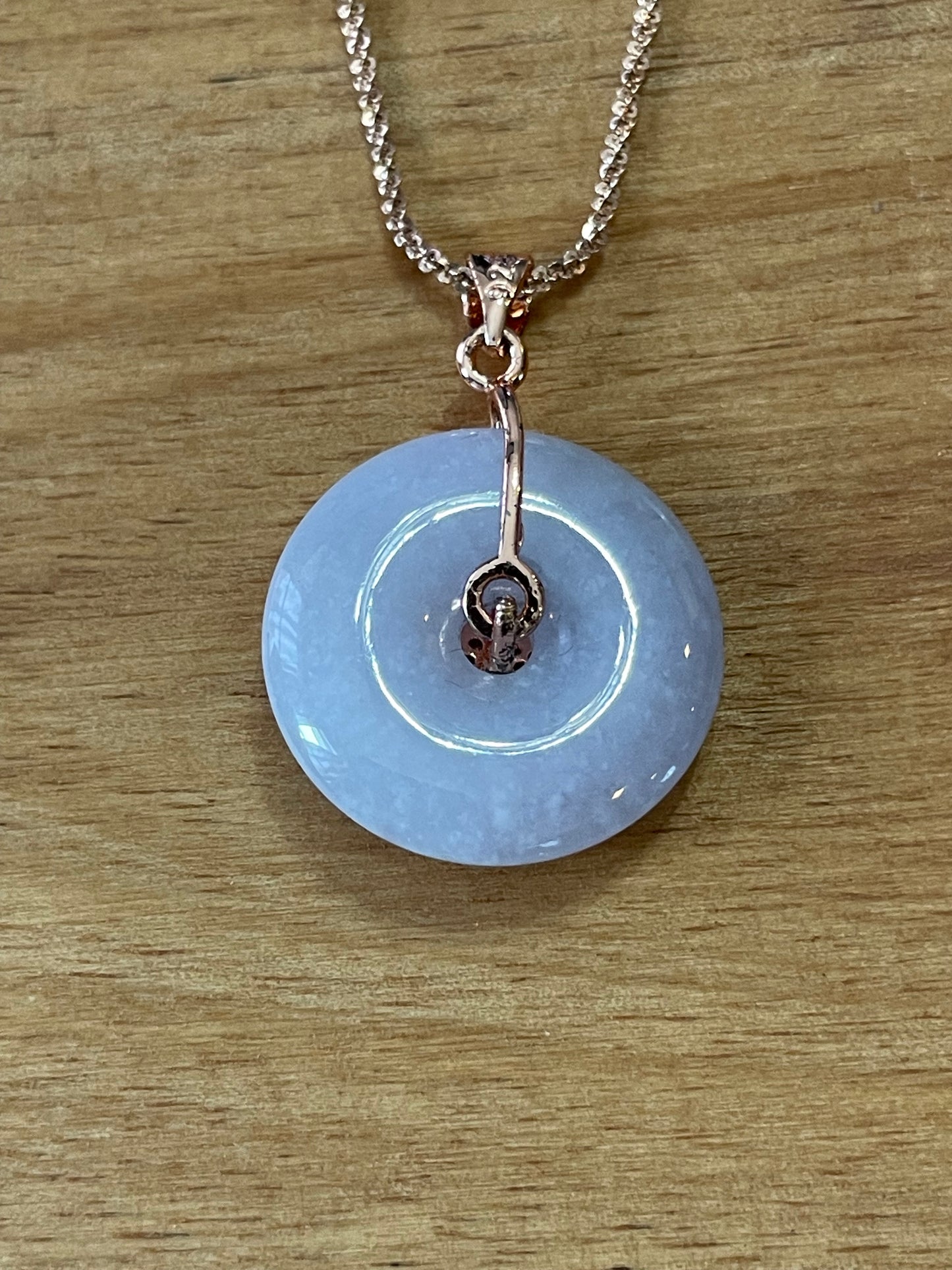 Grade A Natural Burma lavender Jadeite Pi Disc (peng on kou, donut) pendant with a sterling silver, rose gold plated four leaves clover bail