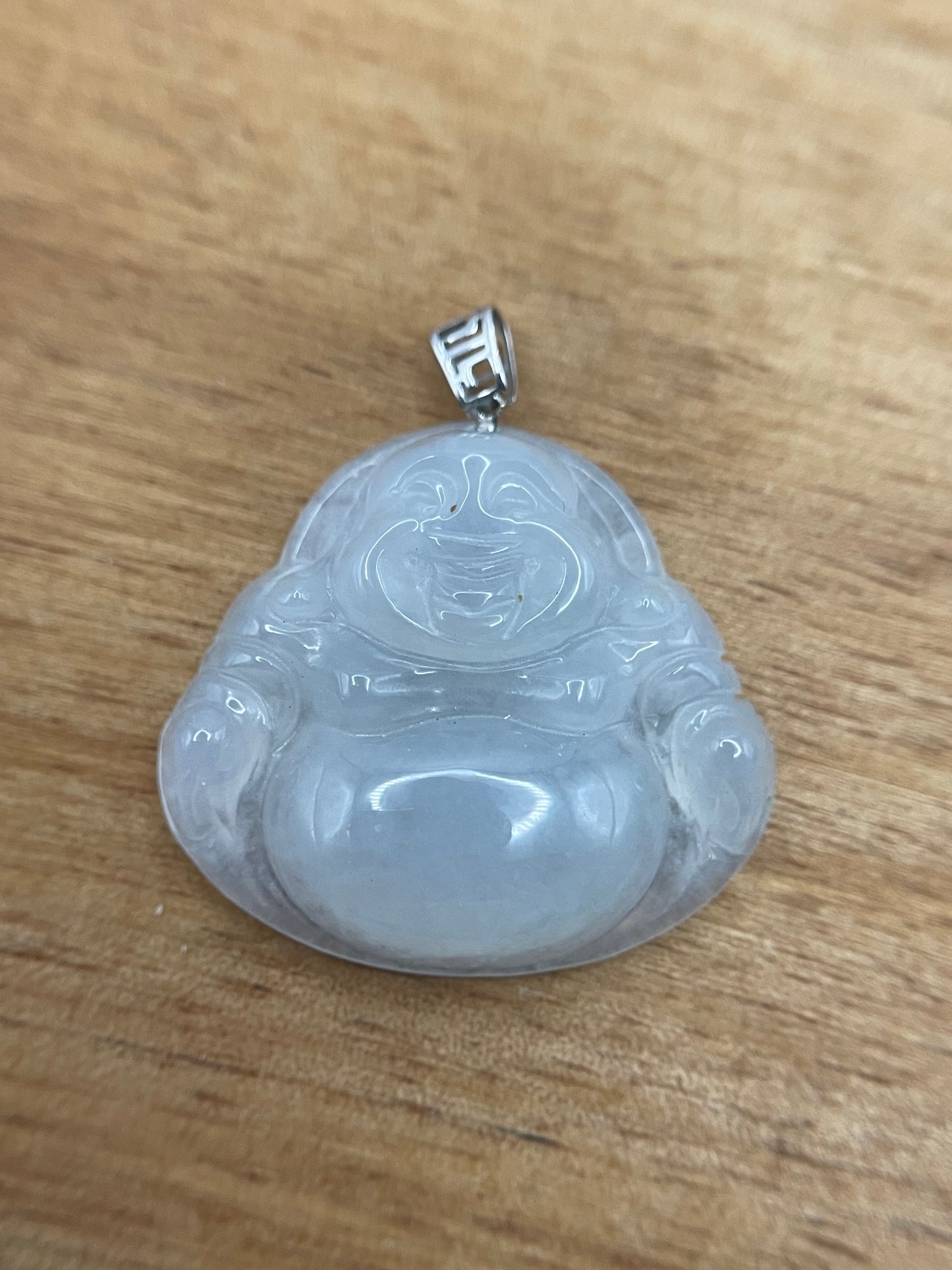 Icy white jadeite Buddha pendant with 18k white gold bail
