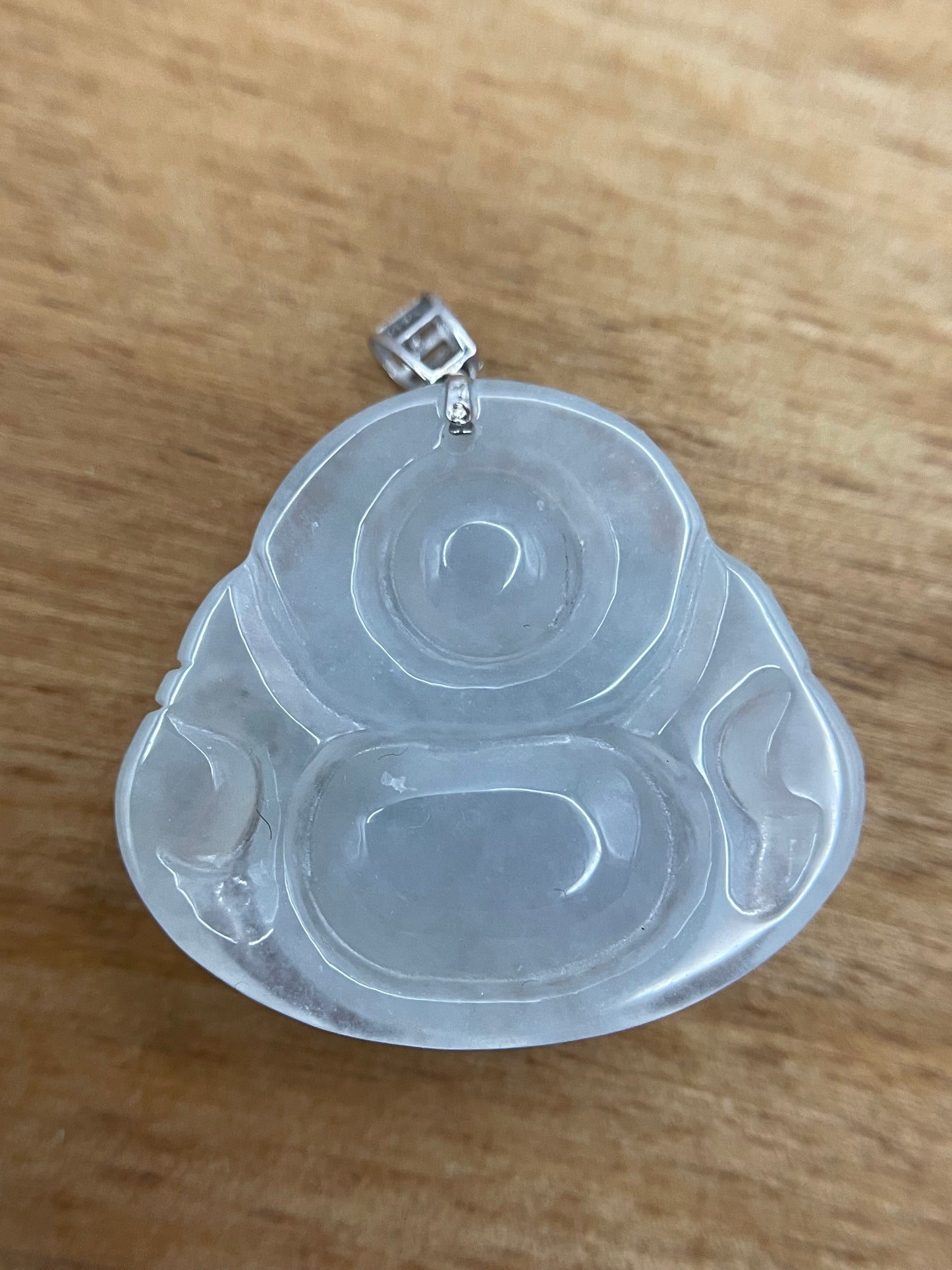 Icy white jadeite Buddha pendant with 18k white gold bail