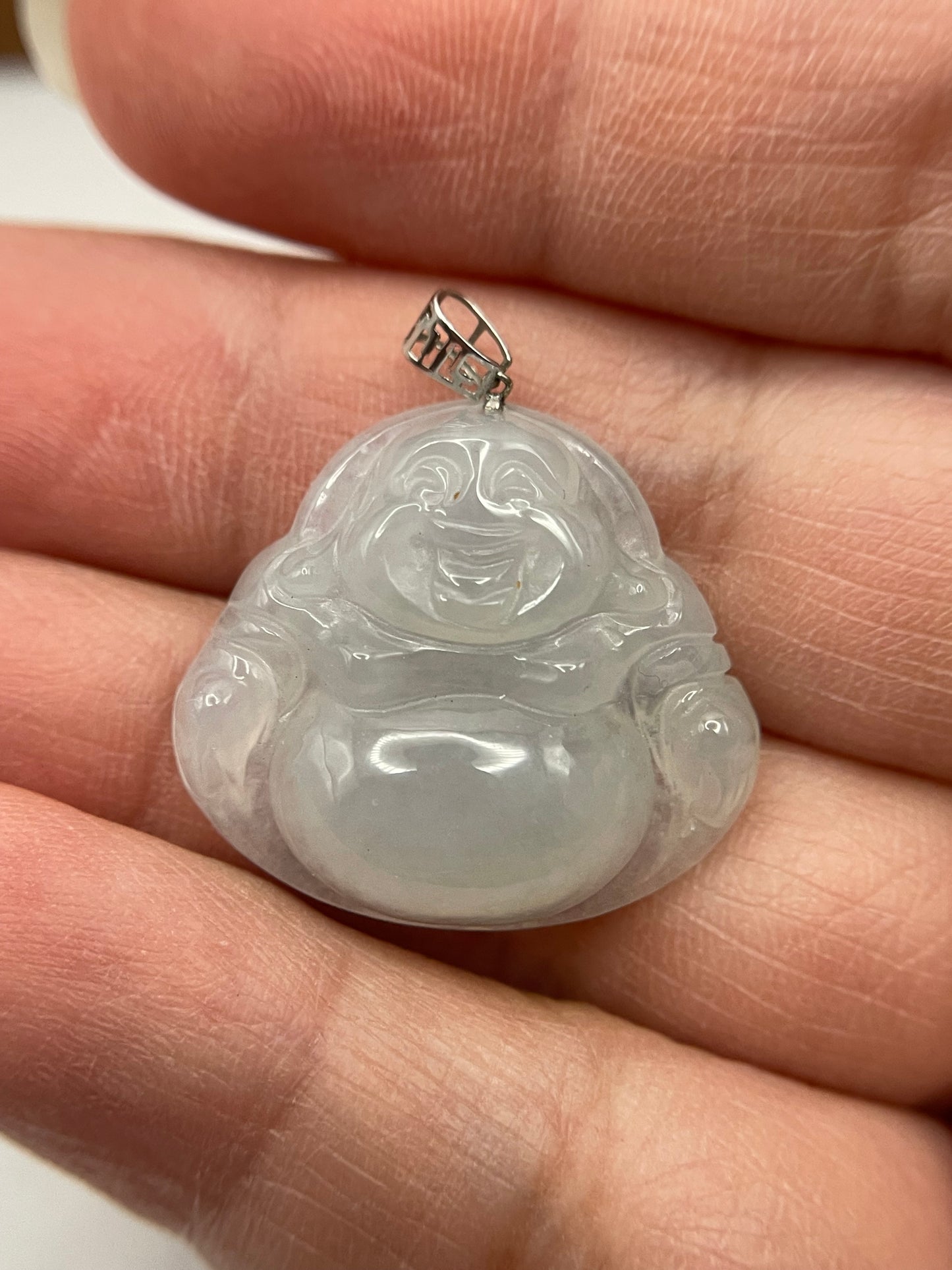 Icy white jadeite Buddha pendant with 18k white gold bail