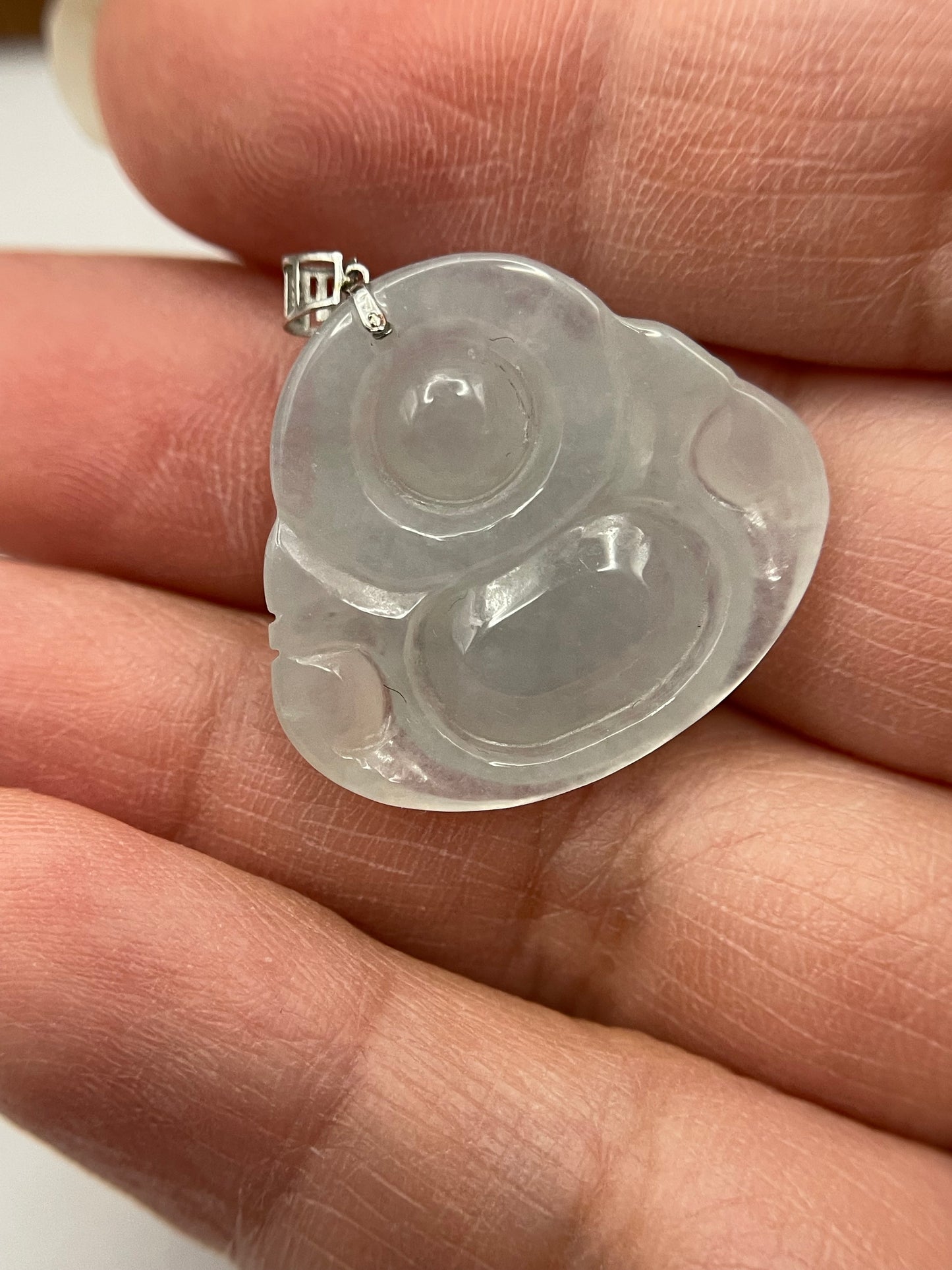 Icy white jadeite Buddha pendant with 18k white gold bail