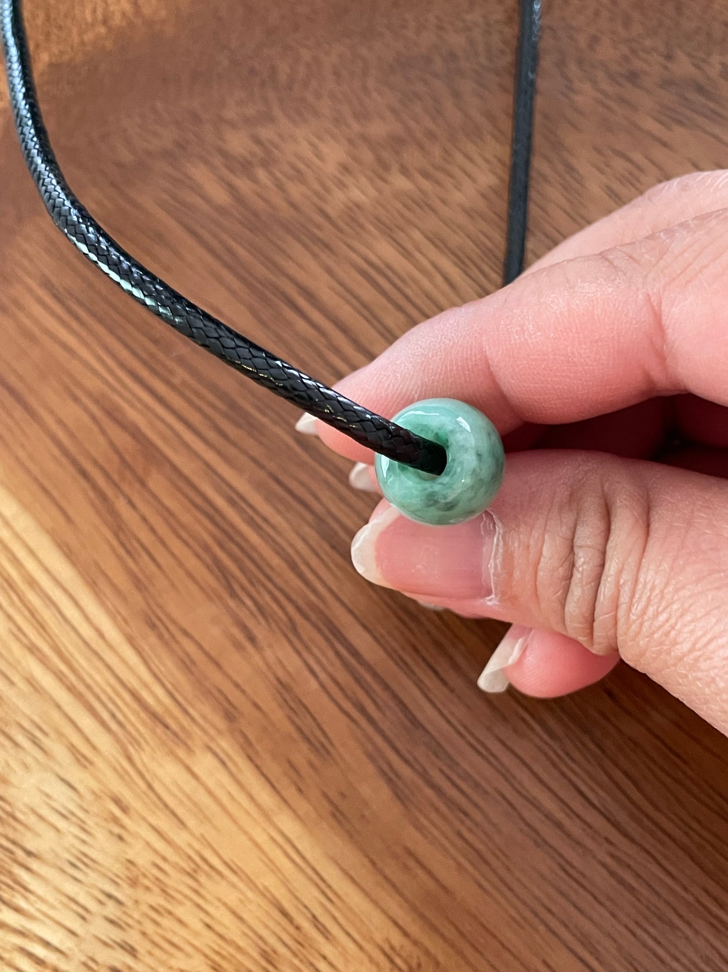 Natural Green Jadeite "Lu Lu Tong"  with Black leather chocker