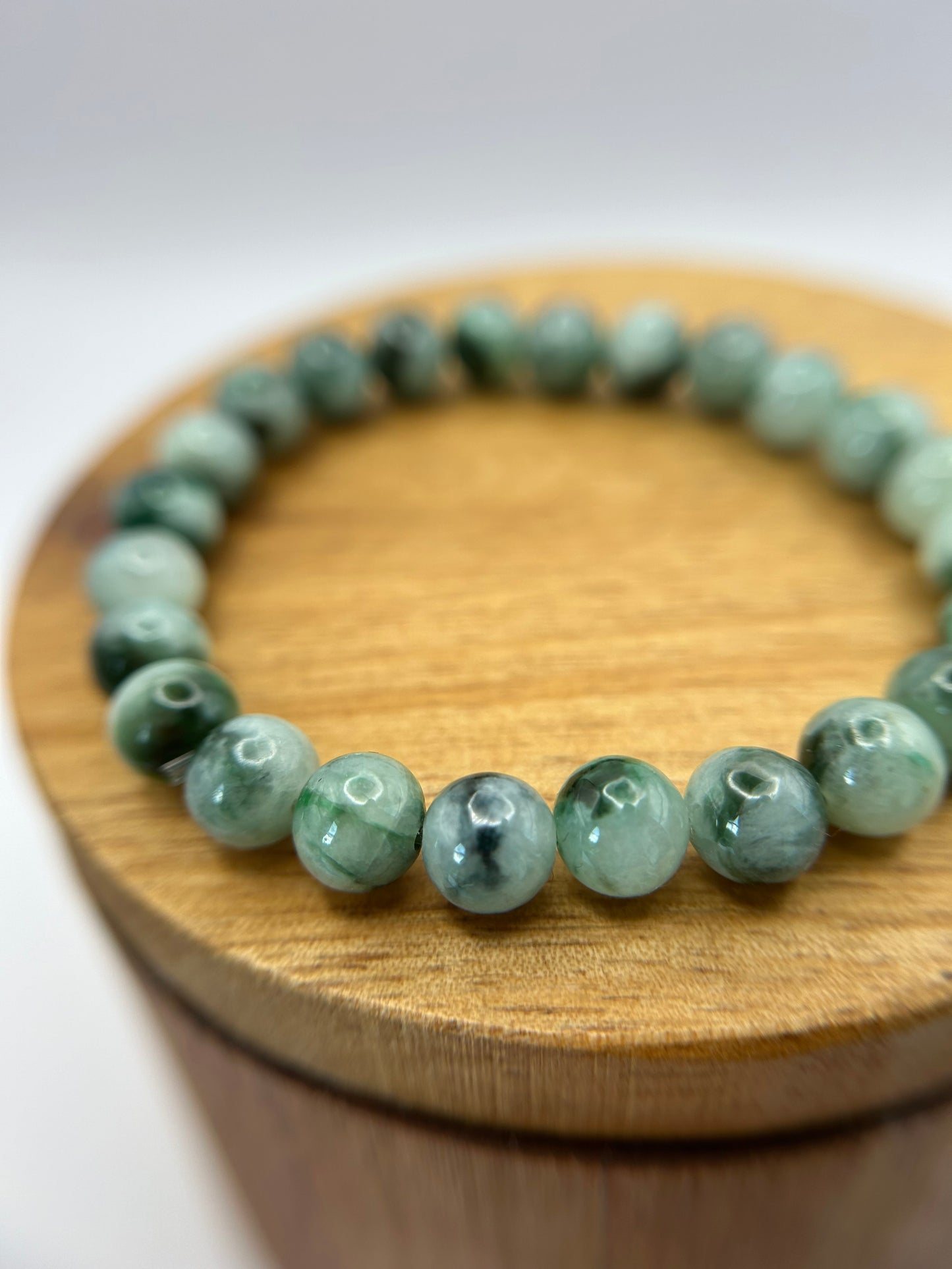 Grade A Natural  Green with Dark Green patches Burma Jadeite beads elastic bracelet