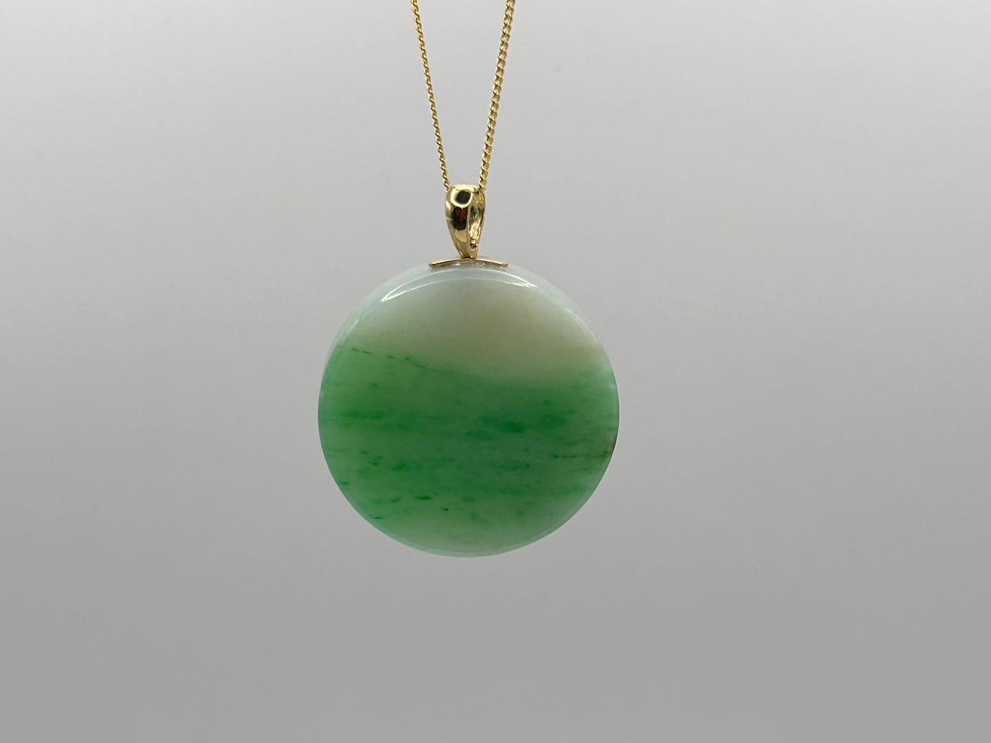 Grade A Natural Green Burma Jadeite Full moon Pendant with 18K yellow gold 360 turn bail