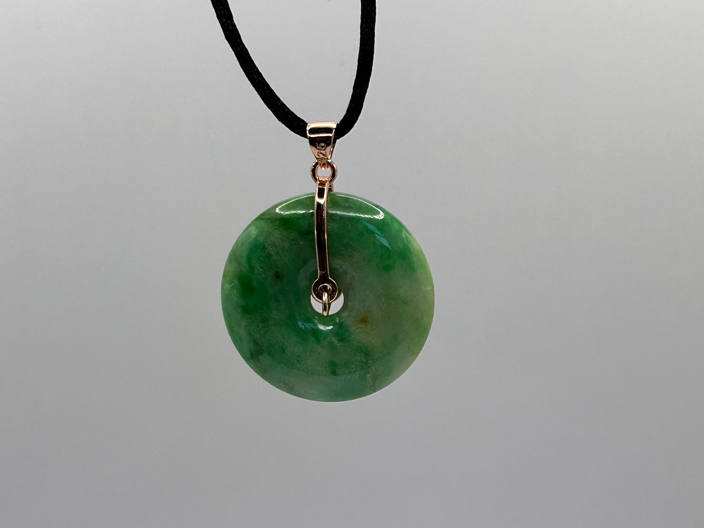 Grade A Natural Icy Green Jadeite  With Rose gold over Sterling Silver bail