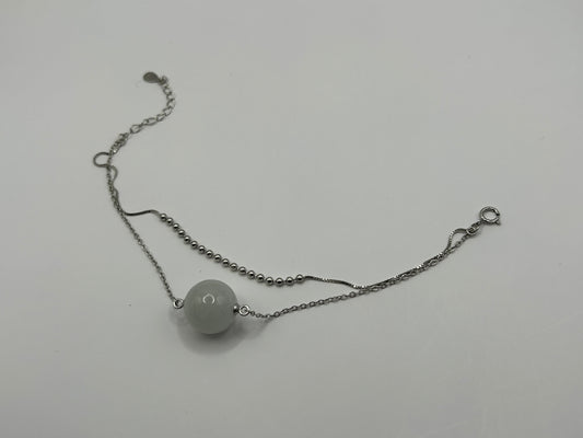 Grade A Natural White Burmese Jadeite bead on a sterling silver bracelet