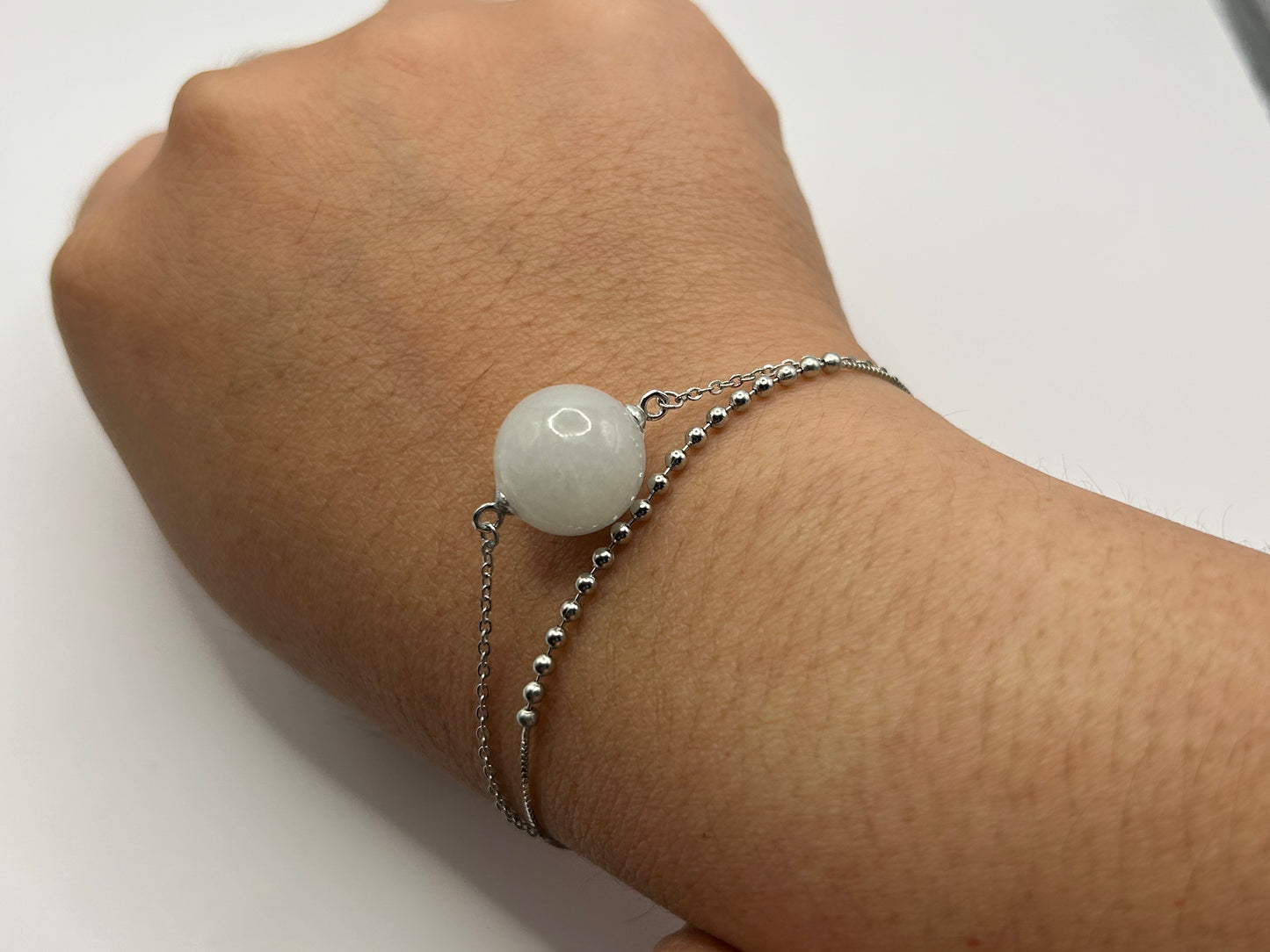 Grade A Natural White Burmese Jadeite bead on a sterling silver bracelet