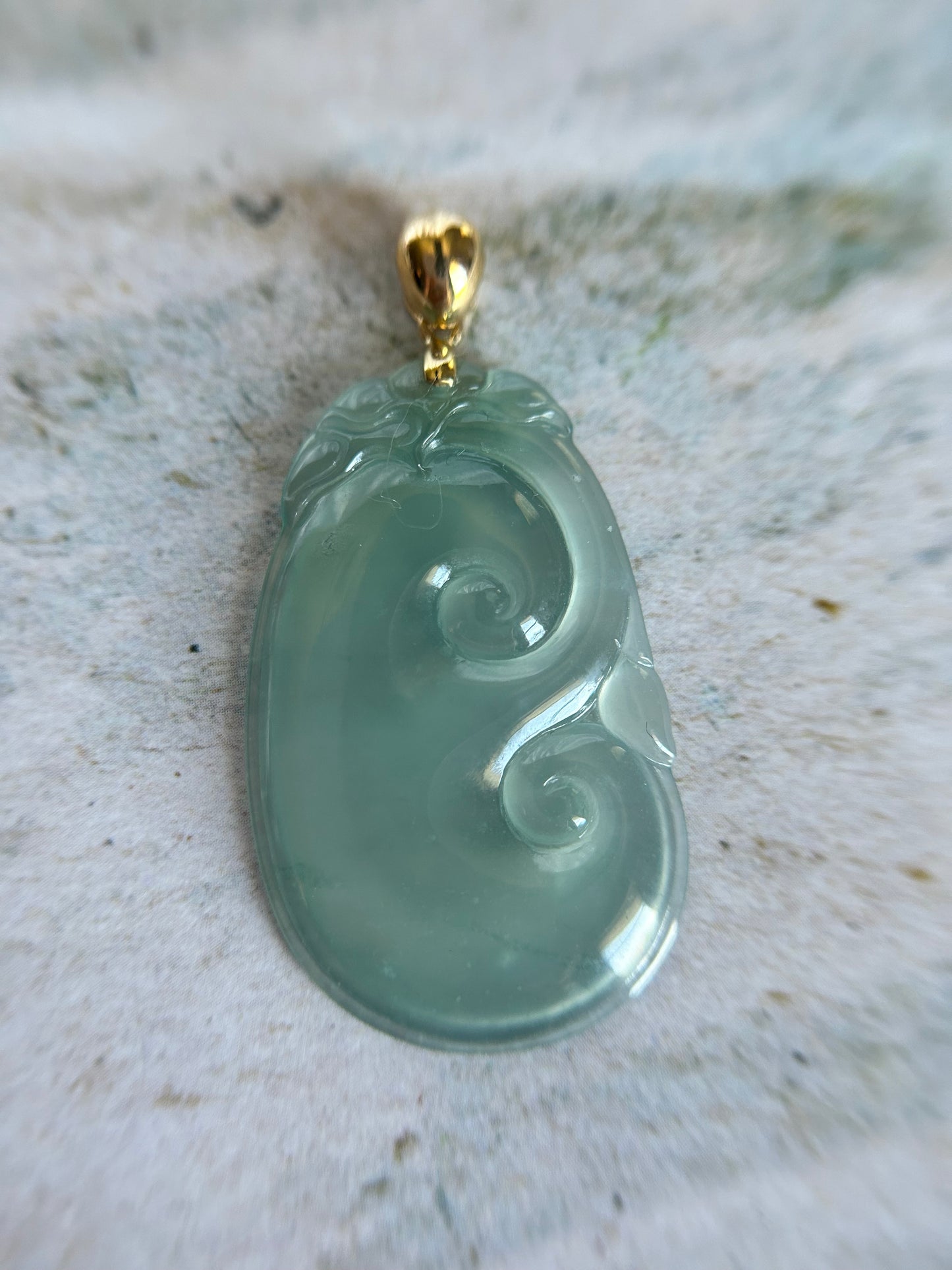 Natural Grade A Burmese Jadeite. 18K Yellow Gold Bail Light bluenish green Yuyi Pendant