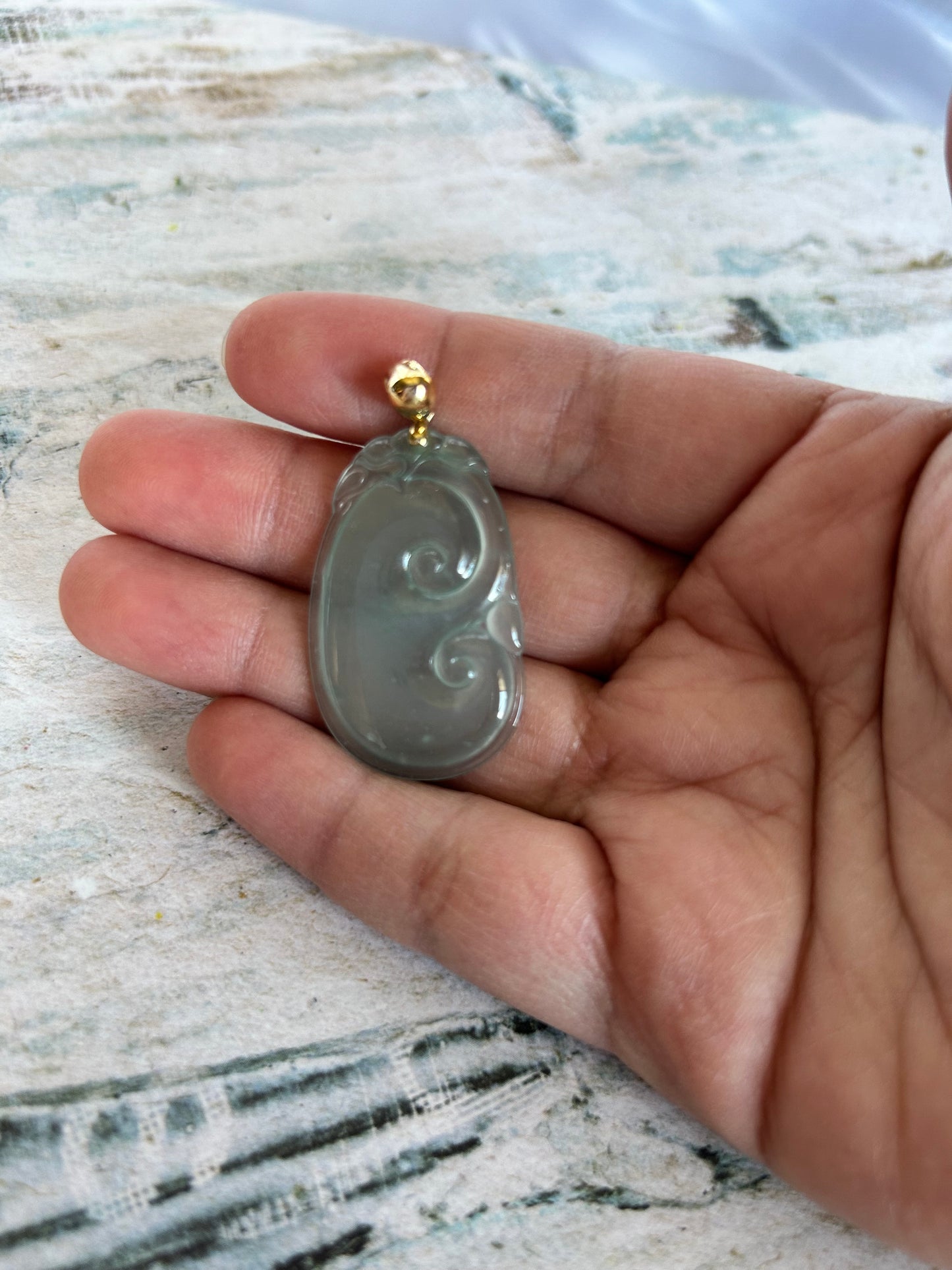 Natural Grade A Burmese Jadeite. 18K Yellow Gold Bail Light bluenish green Yuyi Pendant