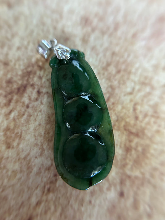 Grade A Natural deep green Three peas in a pod Jadeite pendant.