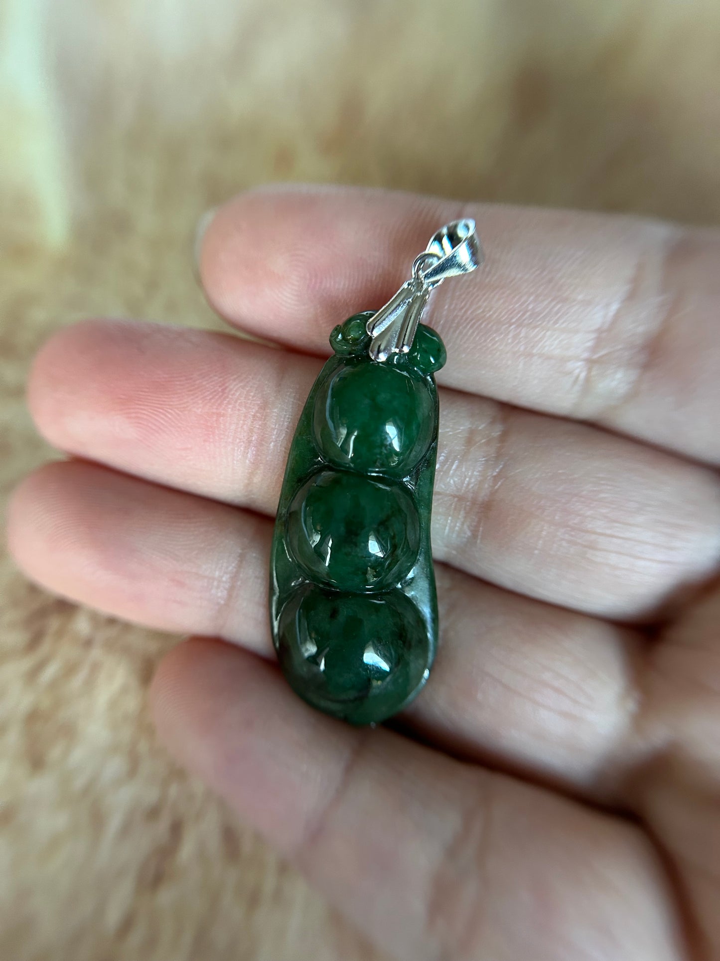 Grade A Natural deep green Three peas in a pod Jadeite pendant.