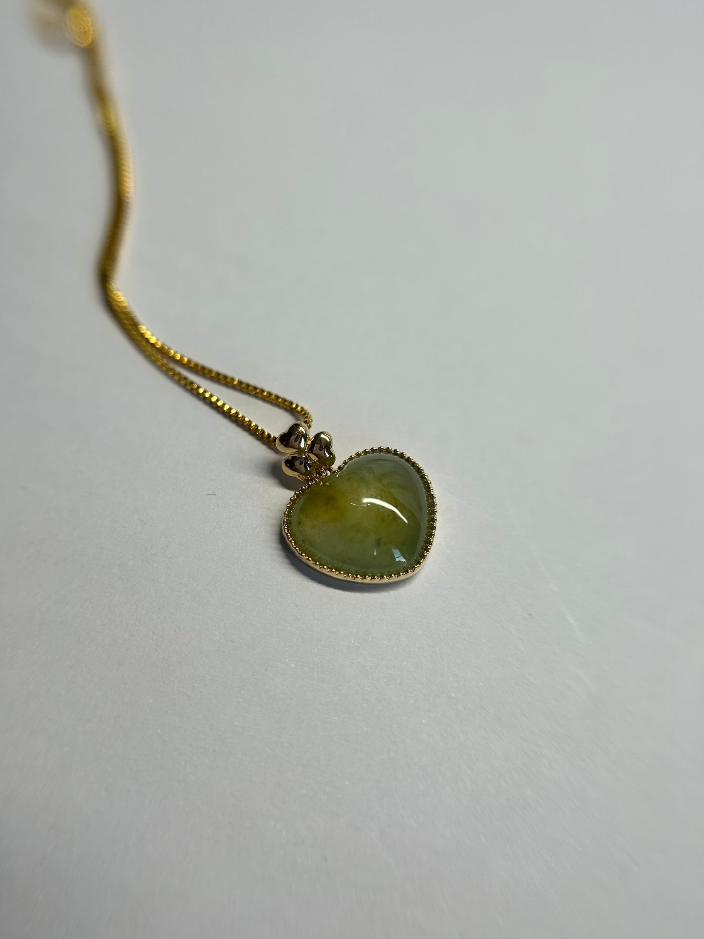 Natural Grade A Burmese Jadeite 18K yellow gold bail icy yellow, and green heart pendant