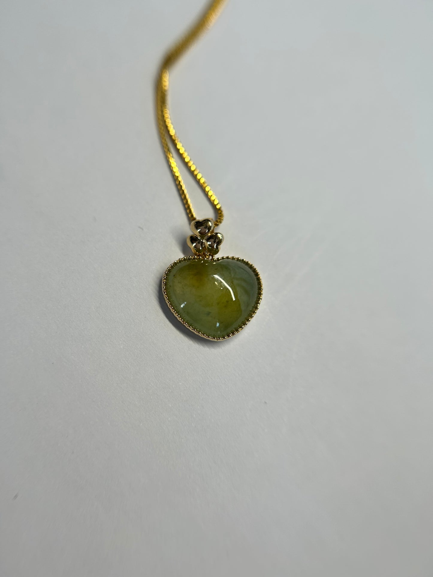 Natural Grade A Burmese Jadeite 18K yellow gold bail icy yellow, and green heart pendant