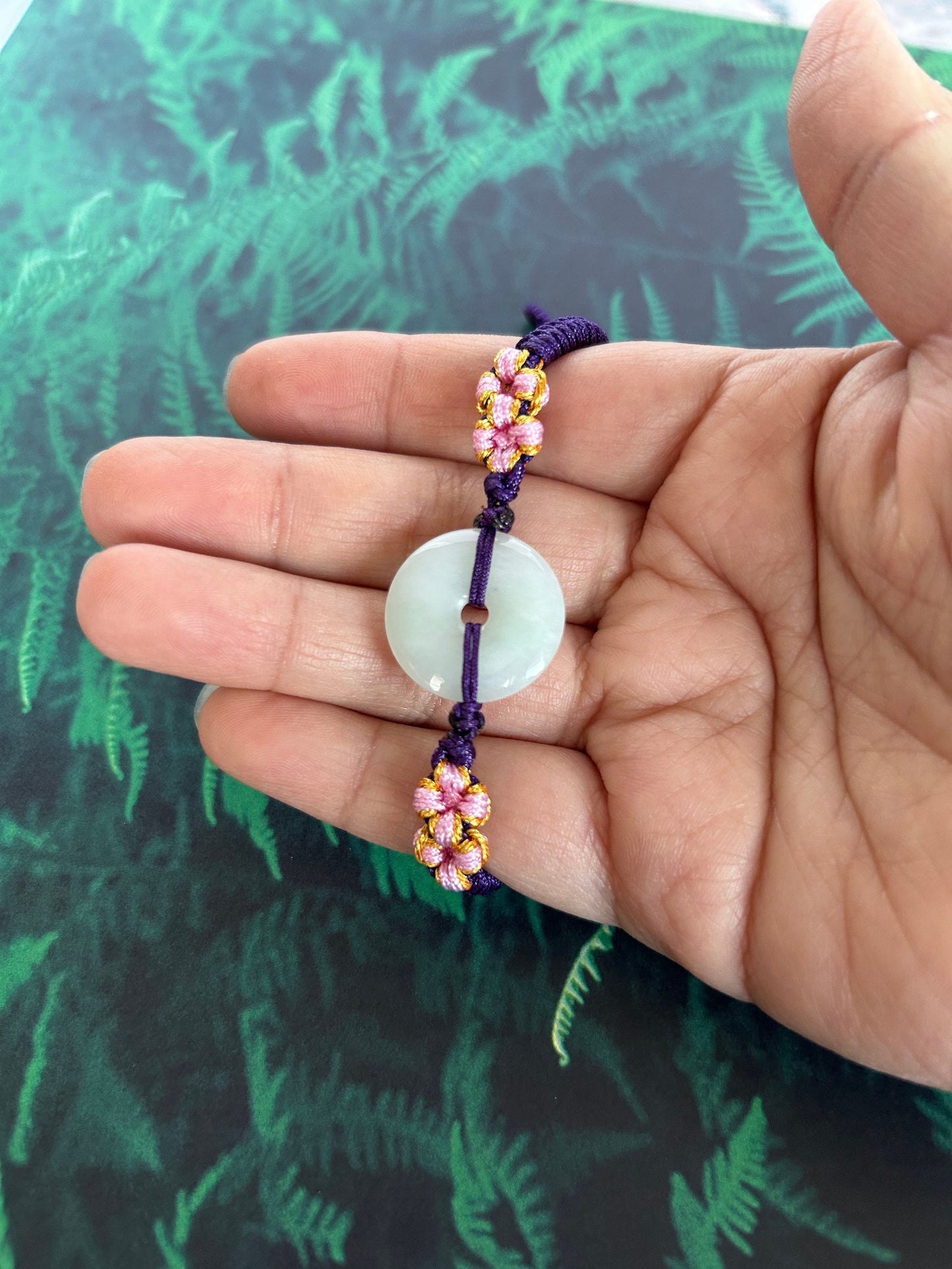 Grade A Natural Icy Green Burma Jadeite braided with purple, yellow, and pink rope details Adjustable Bracelet